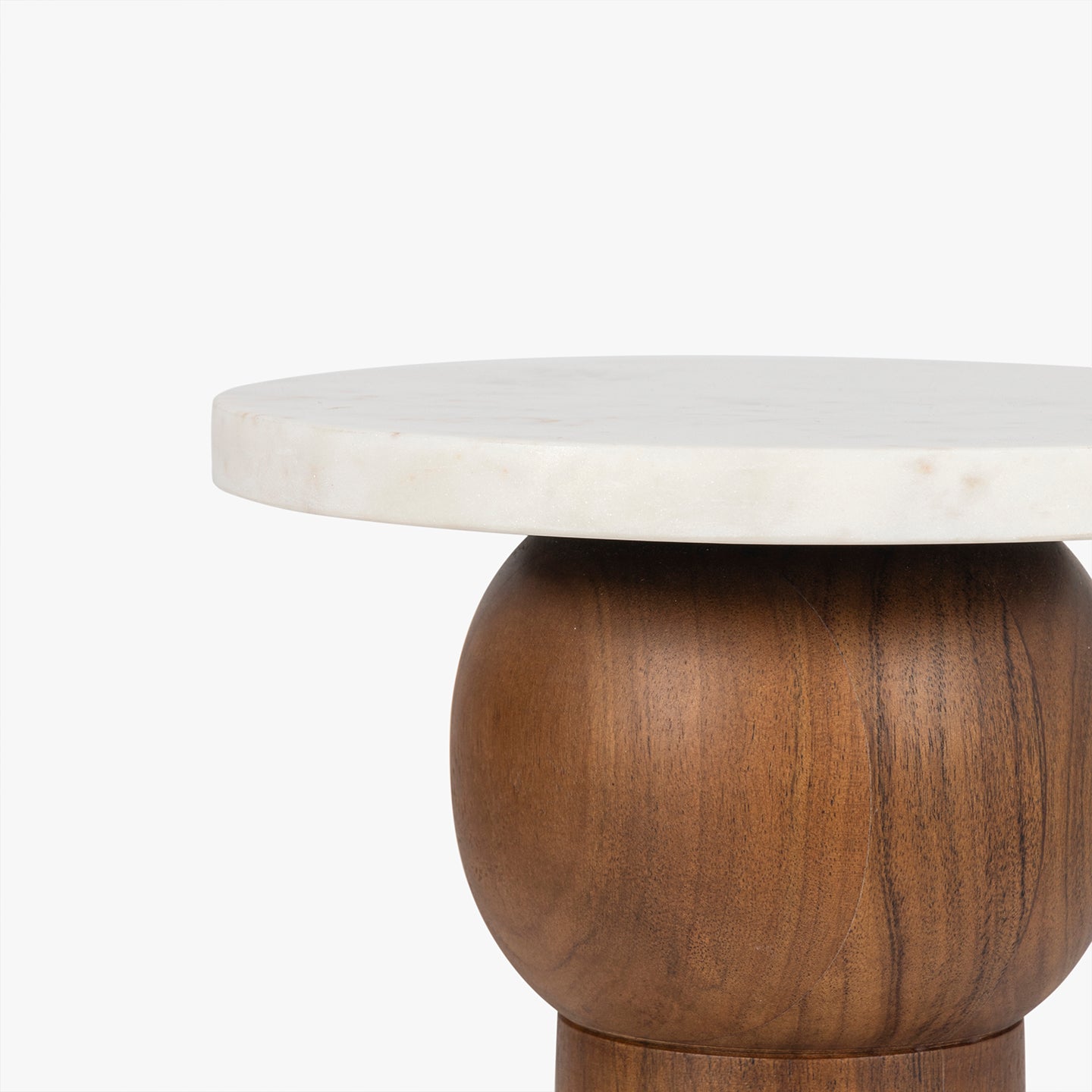 Round table with marble top and wooden base on a white background