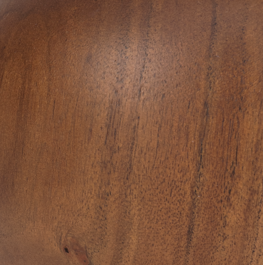 Close-up of a wooden surface with a rich brown color and visible grain.