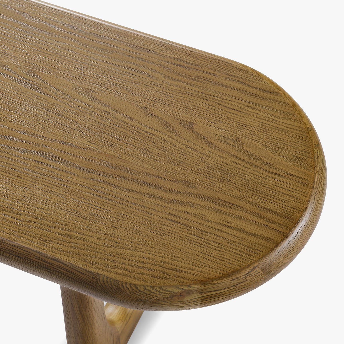 Close-up of a wooden bench with a white background