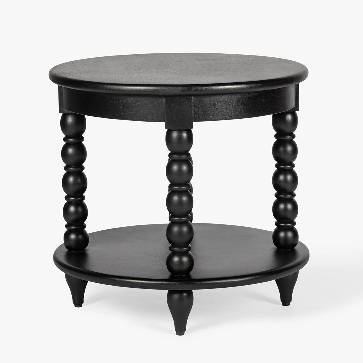 Black round side table with spindle legs on a white background