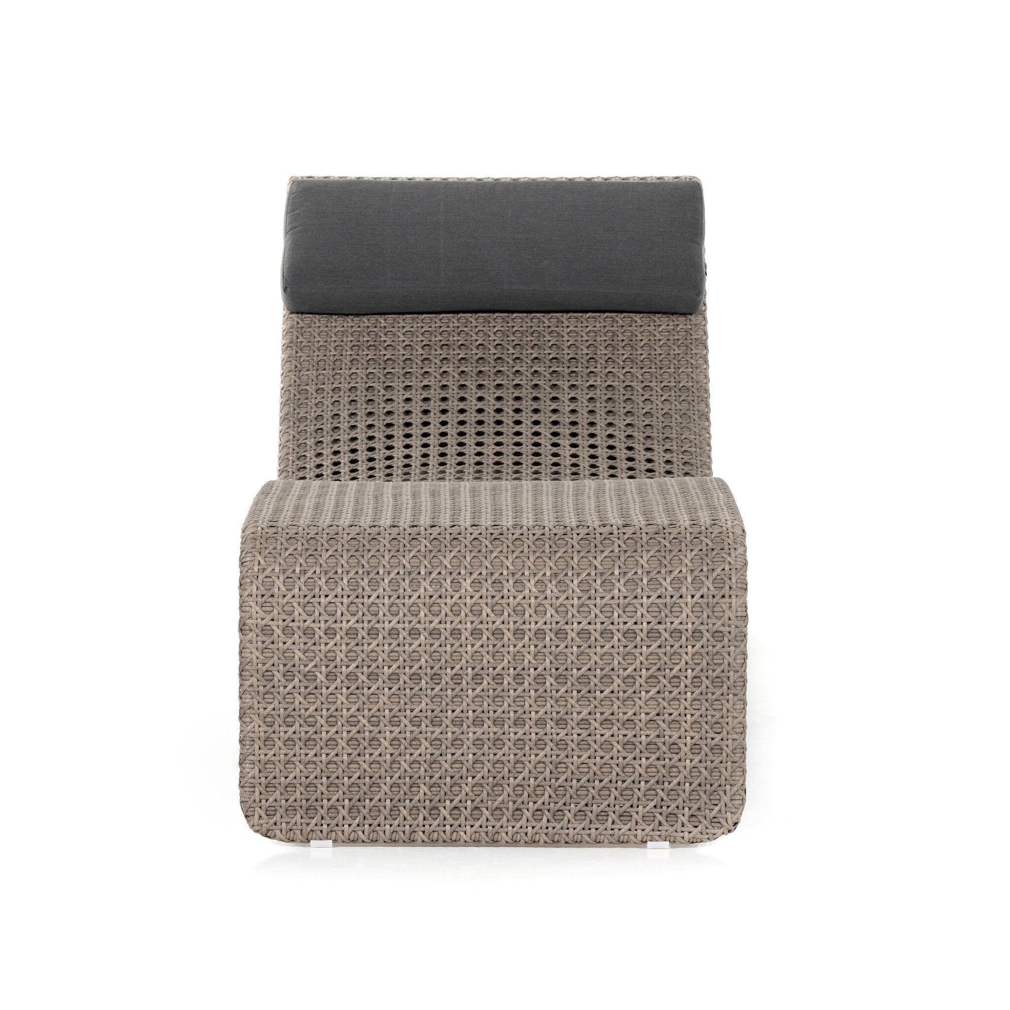 Chair with woven pattern and dark cushion on a white background