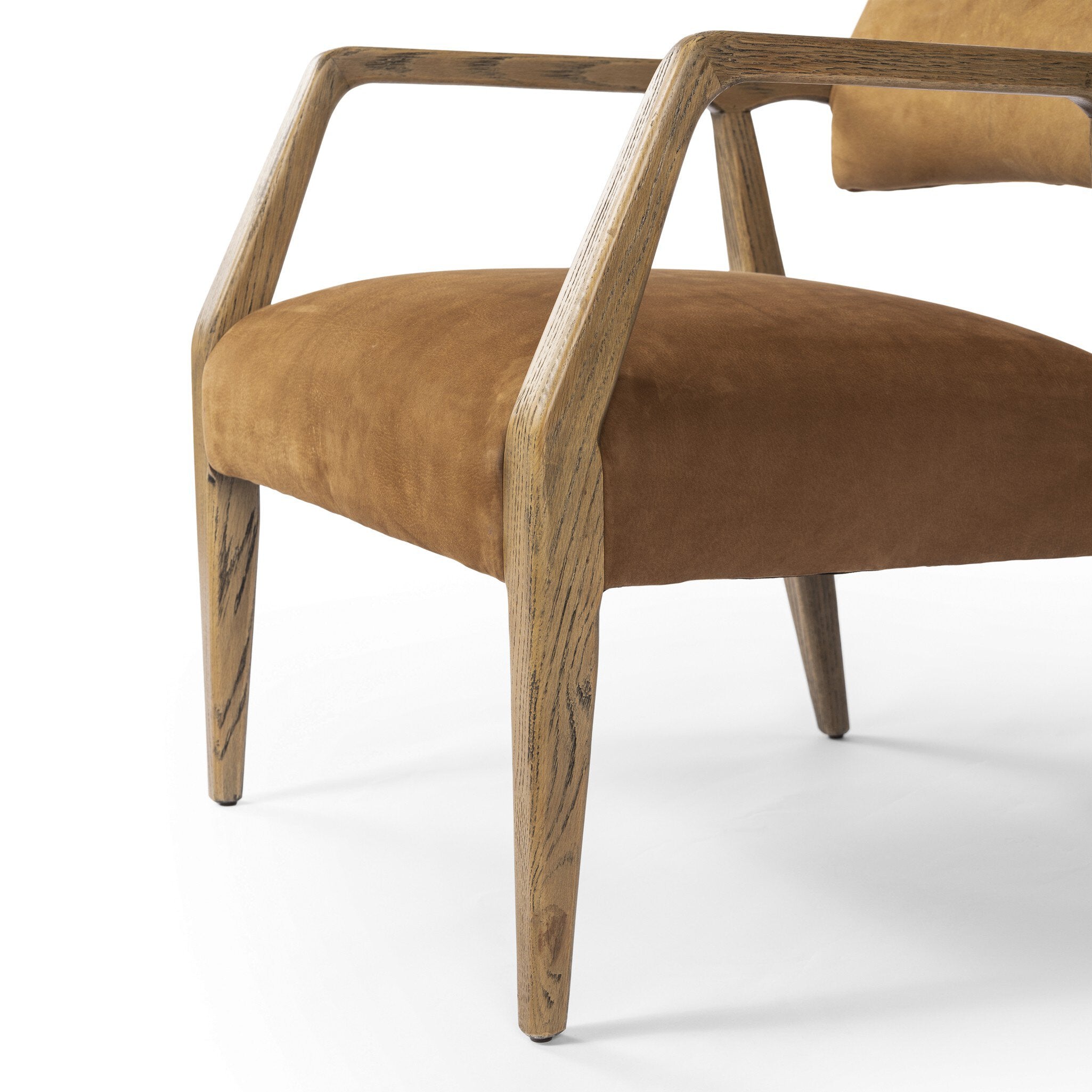 Brown armchair with wooden frame on a white background