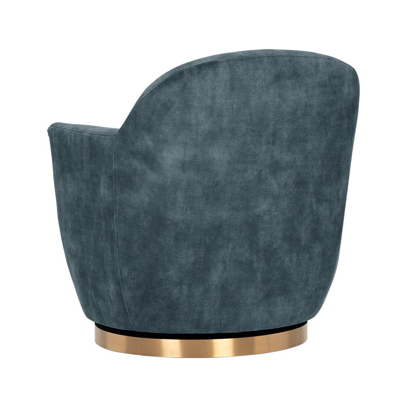 A modern barrel-style accent chair upholstered in textured slate blue velvet, featuring a curved backrest and a circular brushed gold metal base, shown against a solid white background.