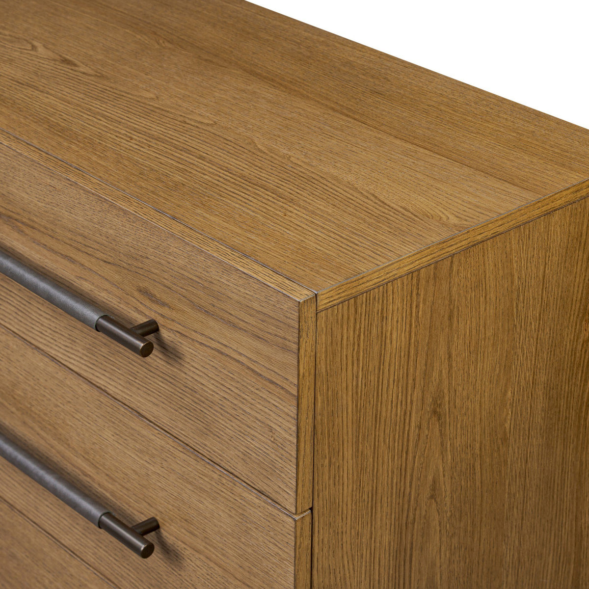 Wooden dresser with two drawers and metal handles on a white background