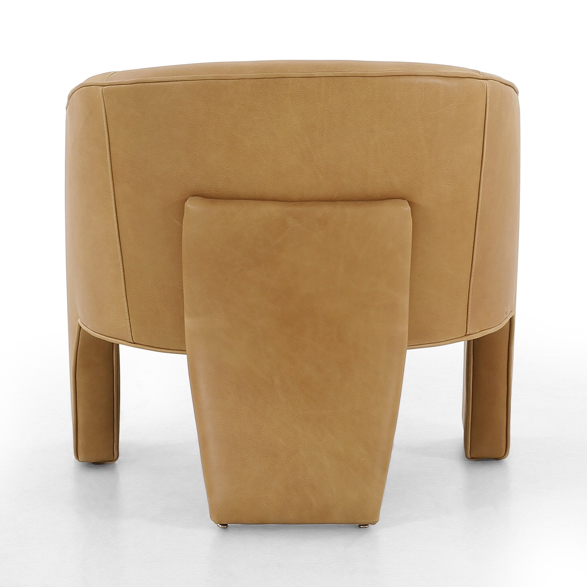 Tan leather ottoman on a white background