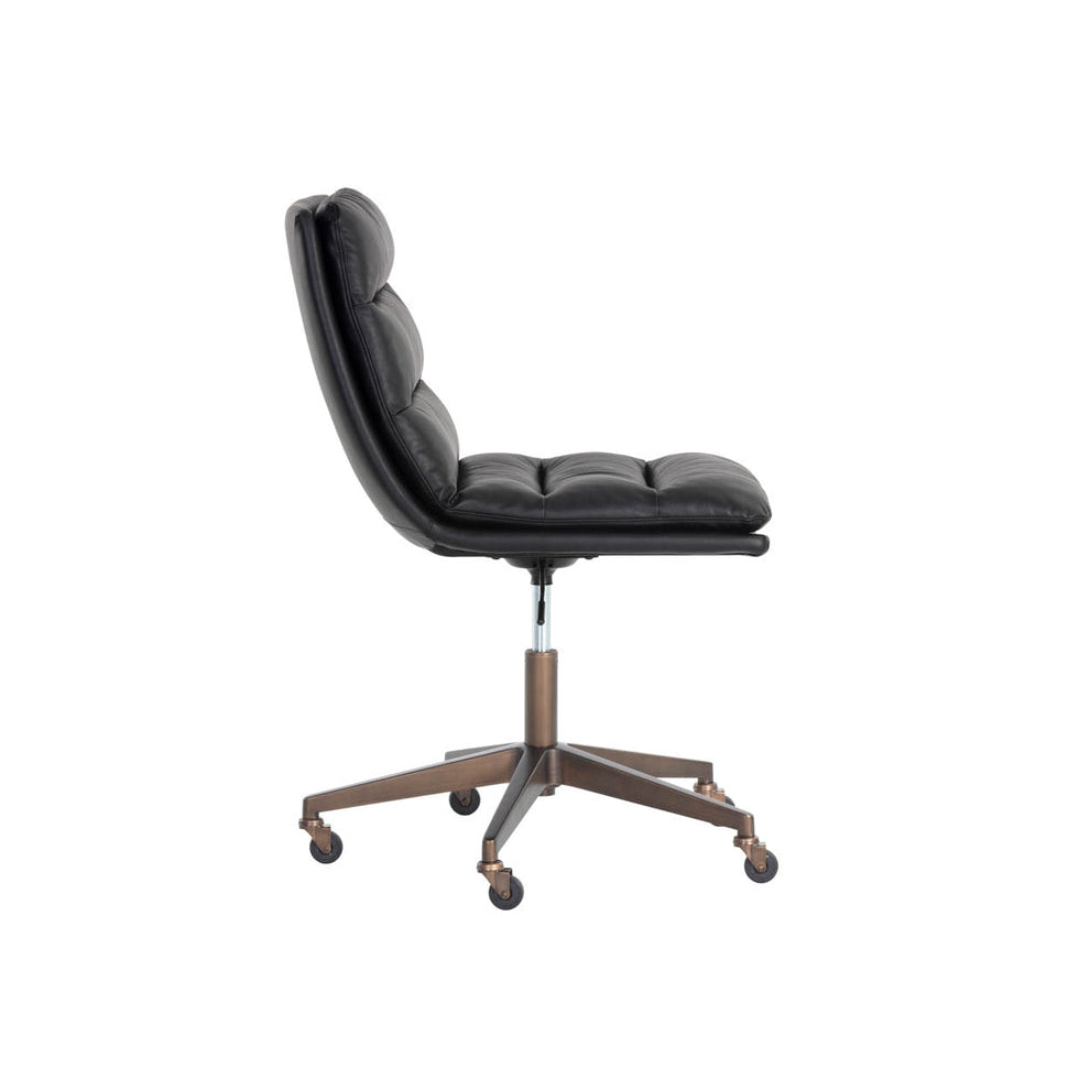 Black office chair with brass base on a white background