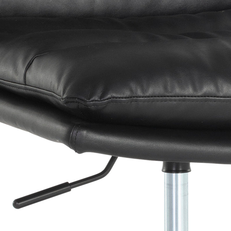 Close-up of a black leather office chair showing the tufted seat cushion, manual lift lever, and part of the metal pedestal base against a white background.