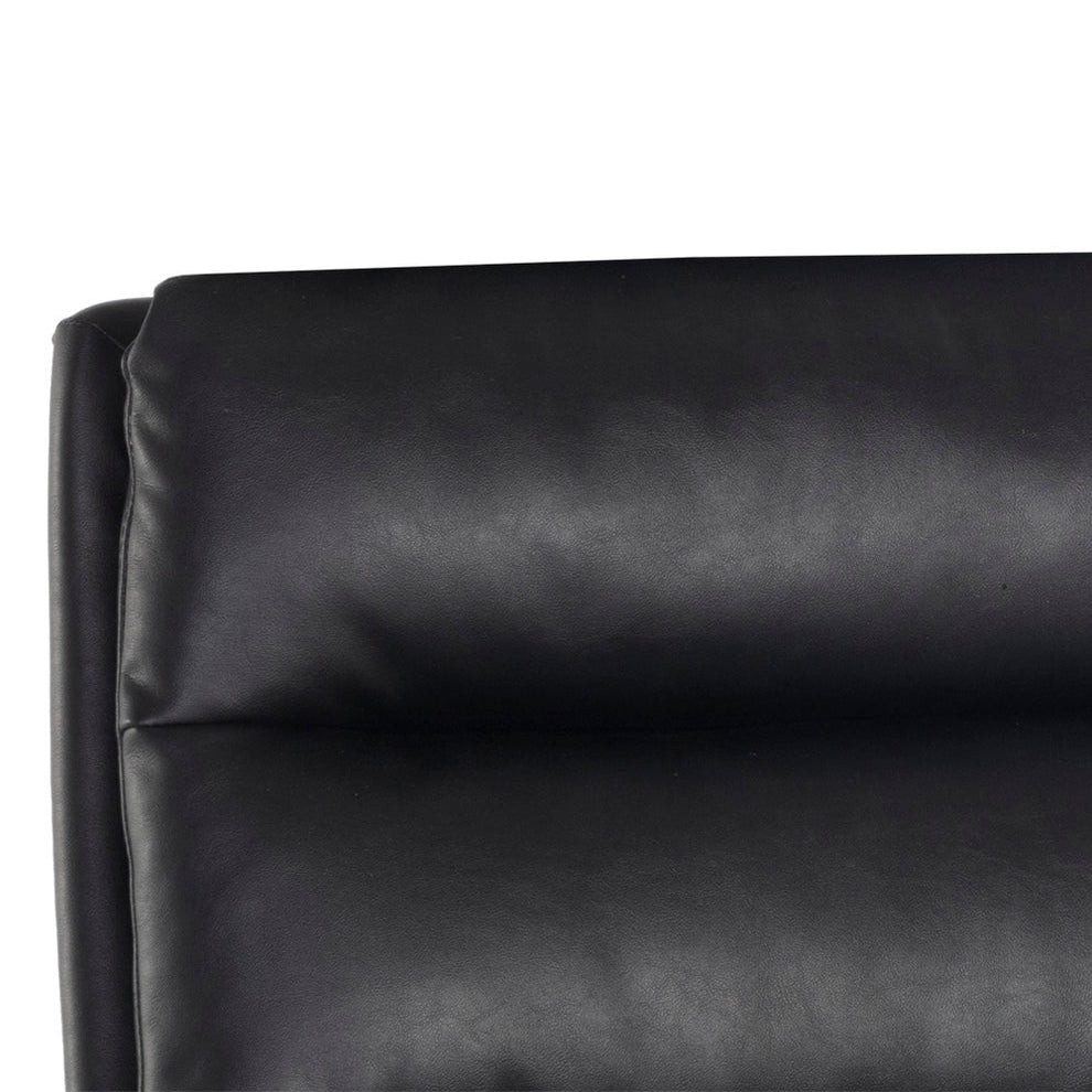 Close-up of a black leather or faux-leather upholstered furniture piece, showing the smooth texture and seam of the cushion against a plain white background.