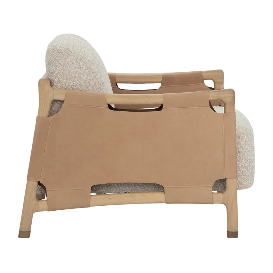 Beige pet bed with cushioned sides on a white background