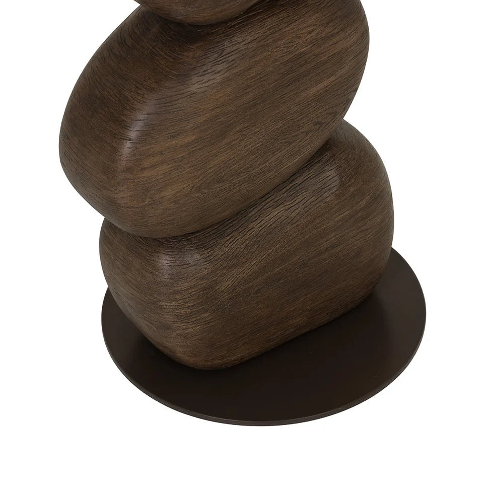 Wood-effect sculptural table base with spiral design on a white background