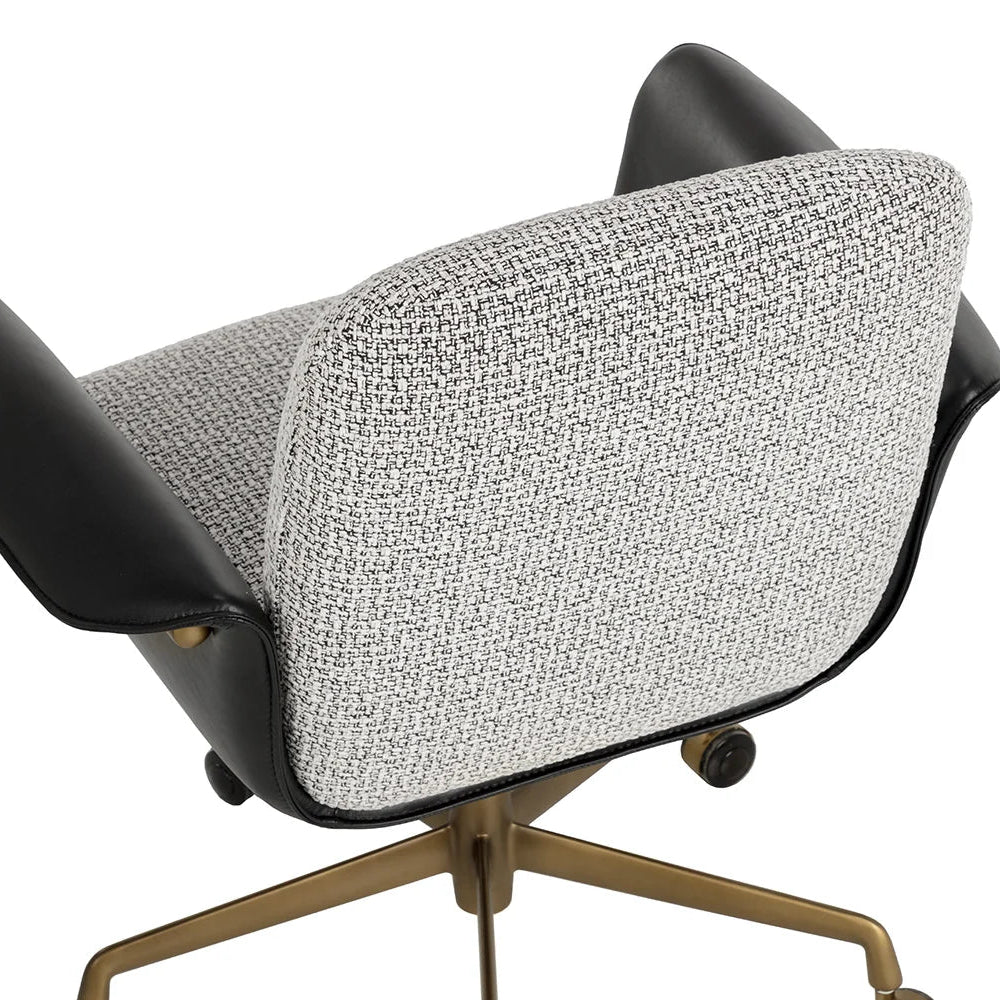 Modern office chair with black and gold base on a white background