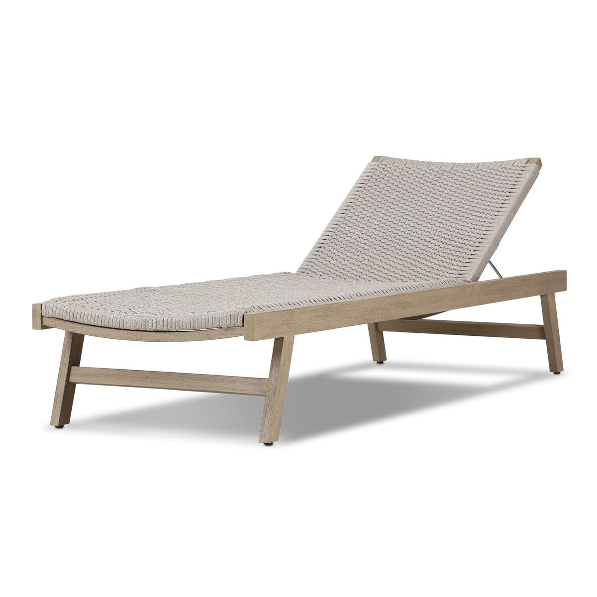 Beige lounge chair with woven backrest on a white background