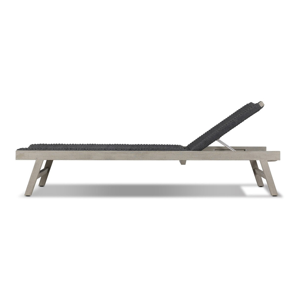 Modern lounge chair with black cushion on a white background