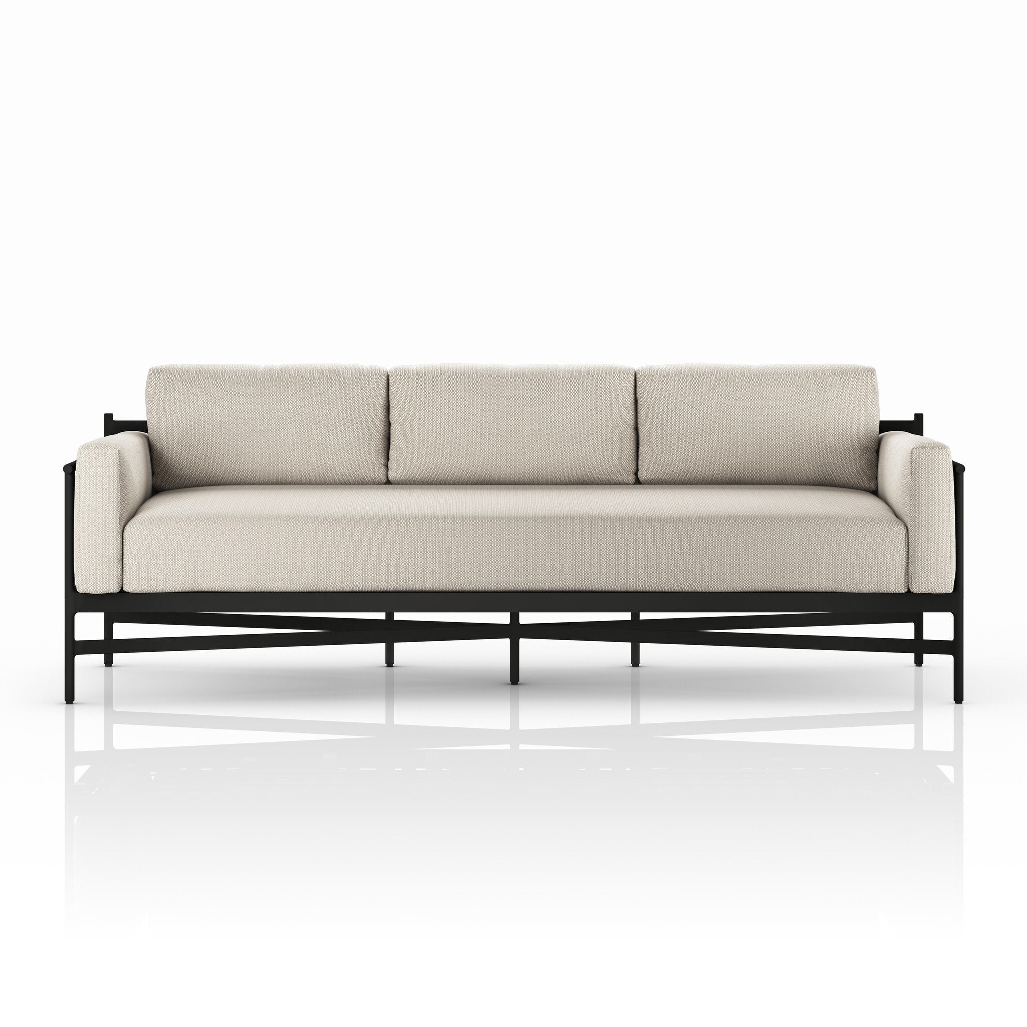Beige sofa with black metal frame on a white background
