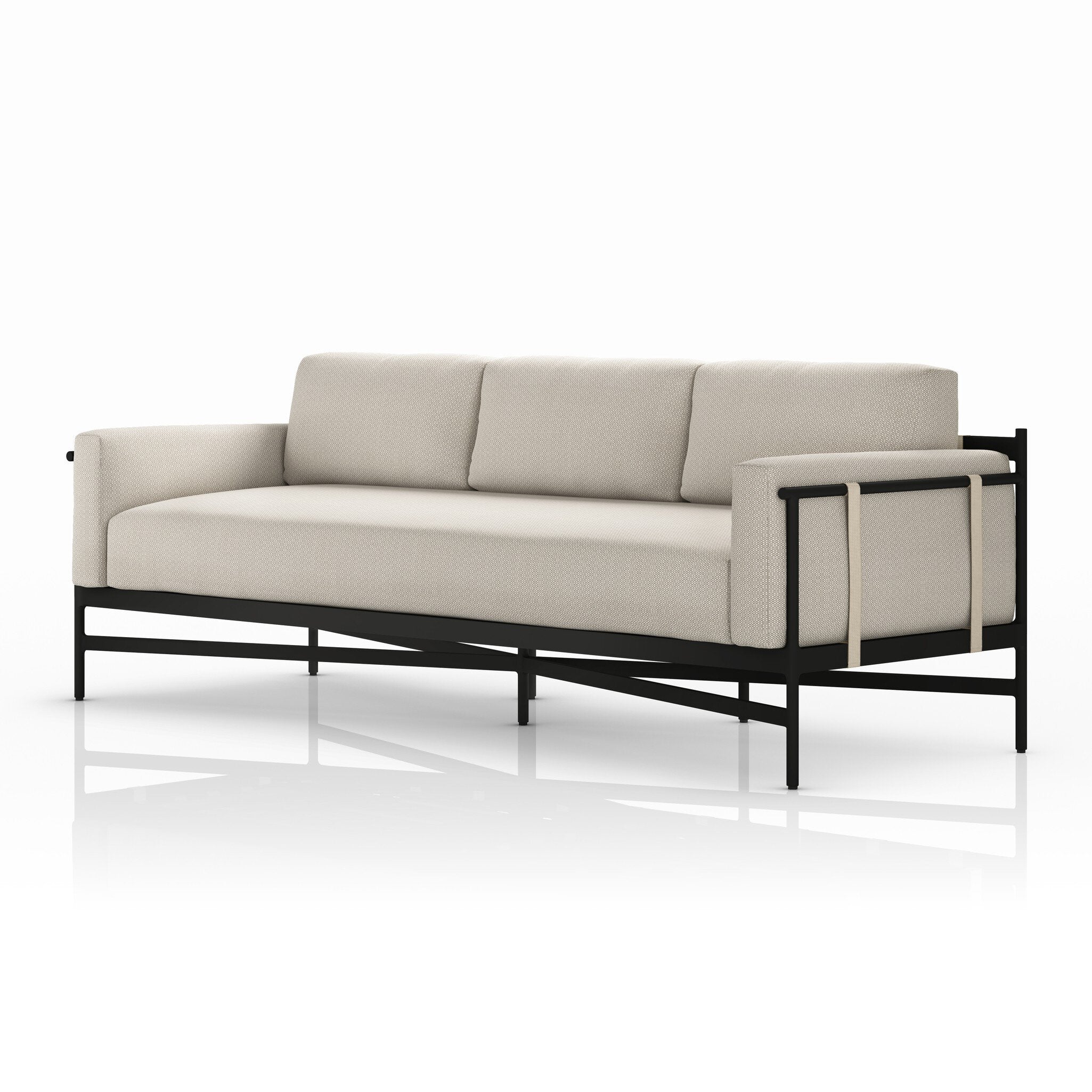 Beige sofa with black metal frame on a white background