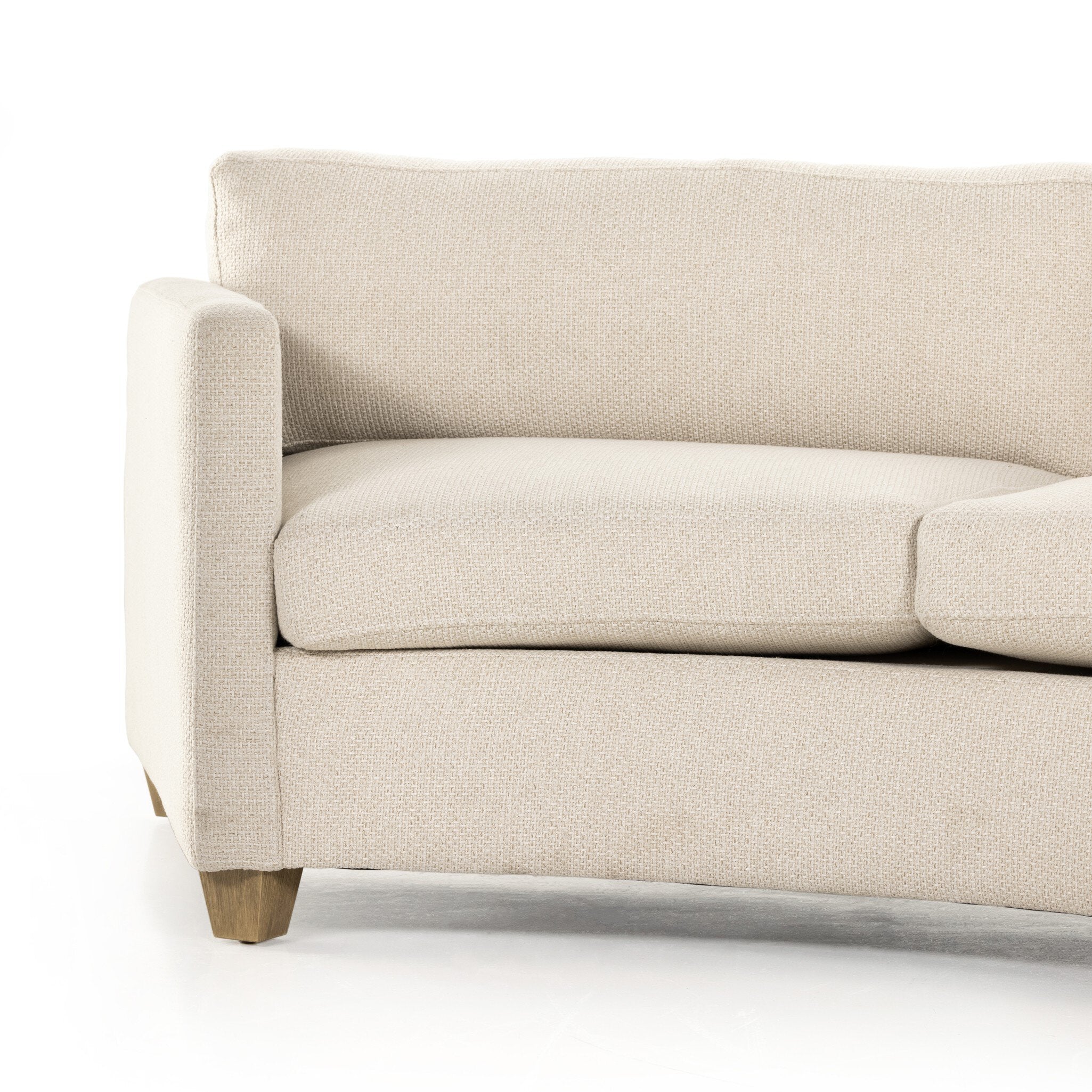 Beige sofa on a white background