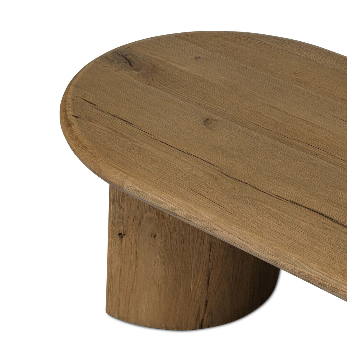 Close-up of a round wooden table with a thick cylindrical base, showing the natural wood grain and finish on a white background.