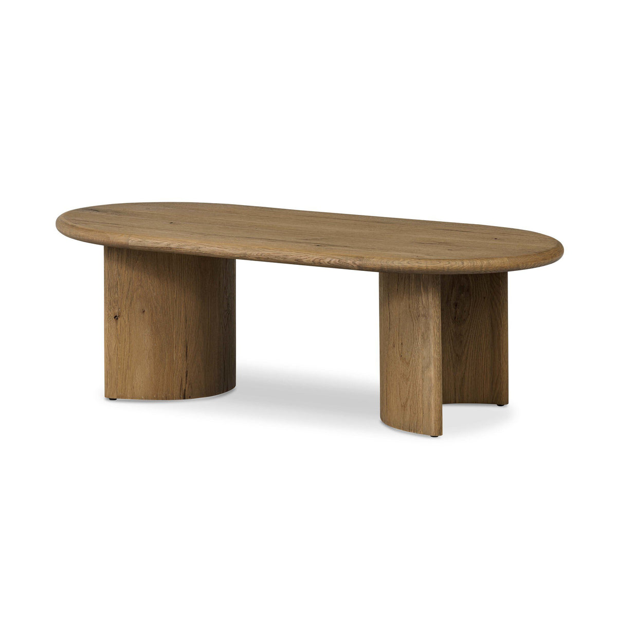 An oval wooden coffee table with a natural oak finish, featuring two thick cylindrical block legs, shown on a plain white background.