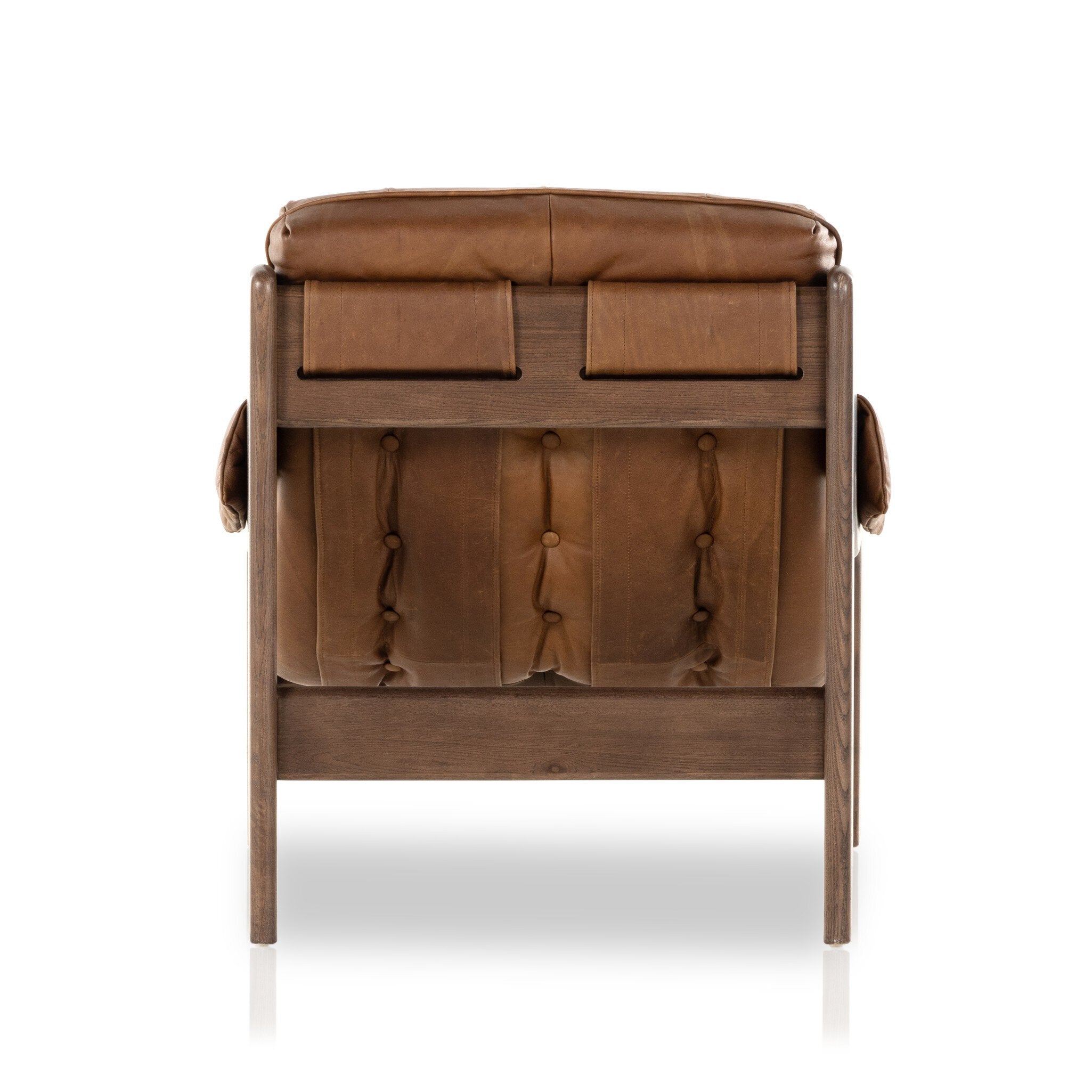 Brown leather armchair on a white background