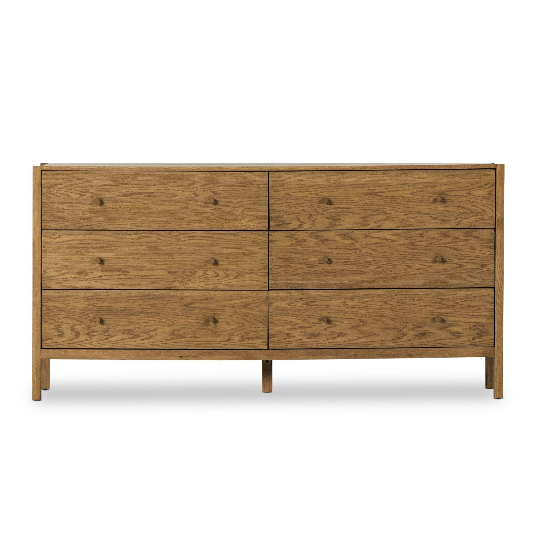 Wooden dresser with six drawers on a white background