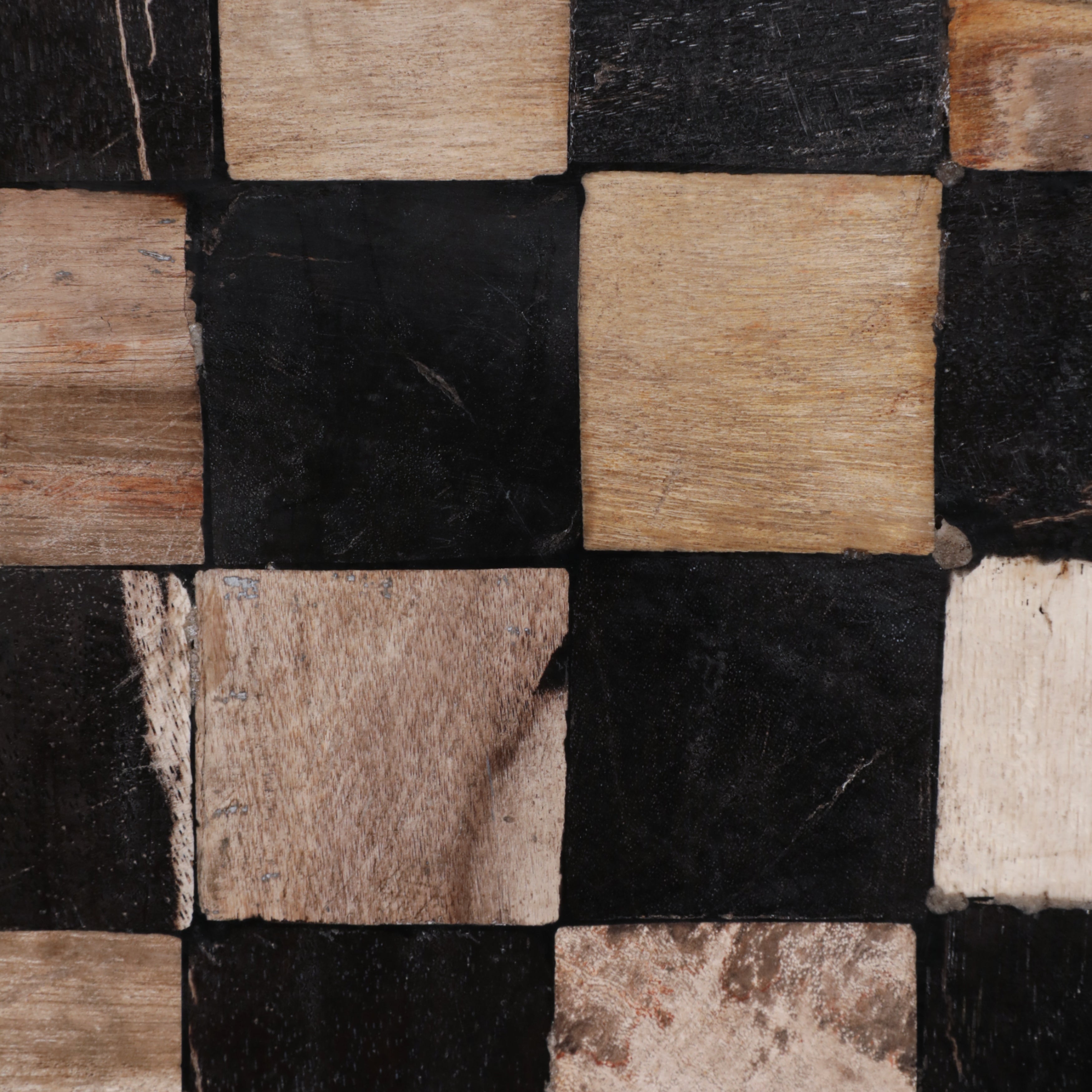Checkerboard pattern of black, brown, and beige tiles