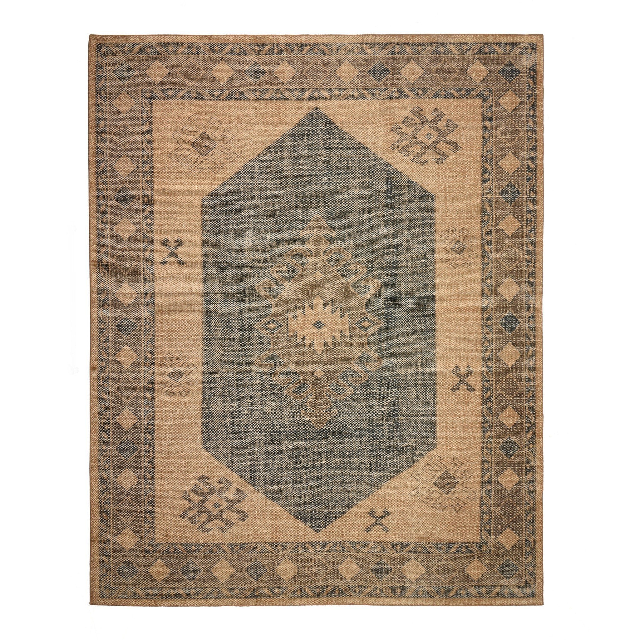 Decorative rug with geometric pattern on a beige and blue background
