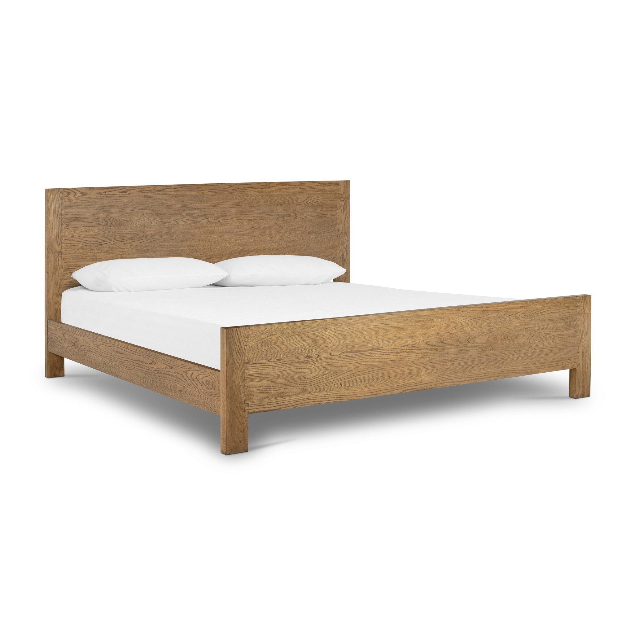 Wooden bed frame with white mattress and pillows