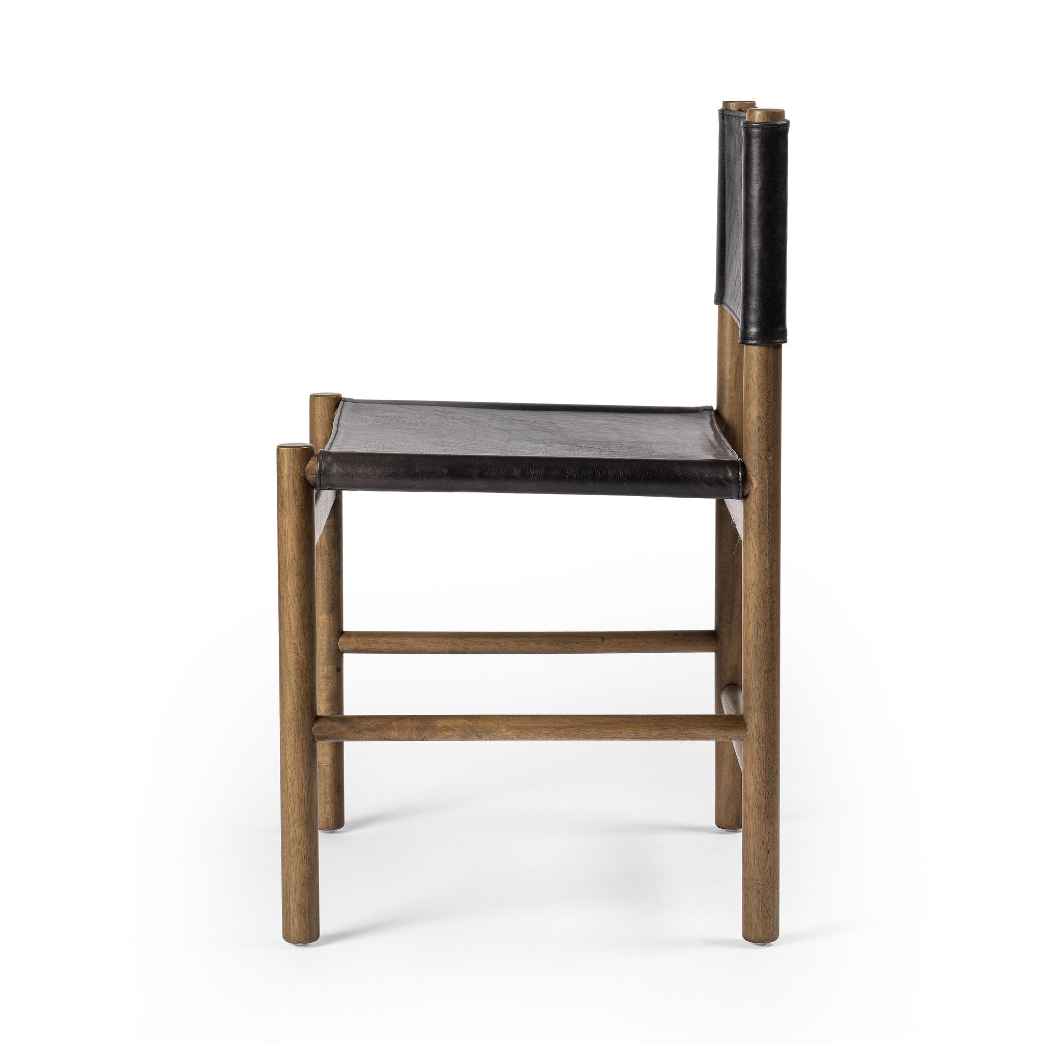 Wooden chair with black leather seat and backrest on a white background