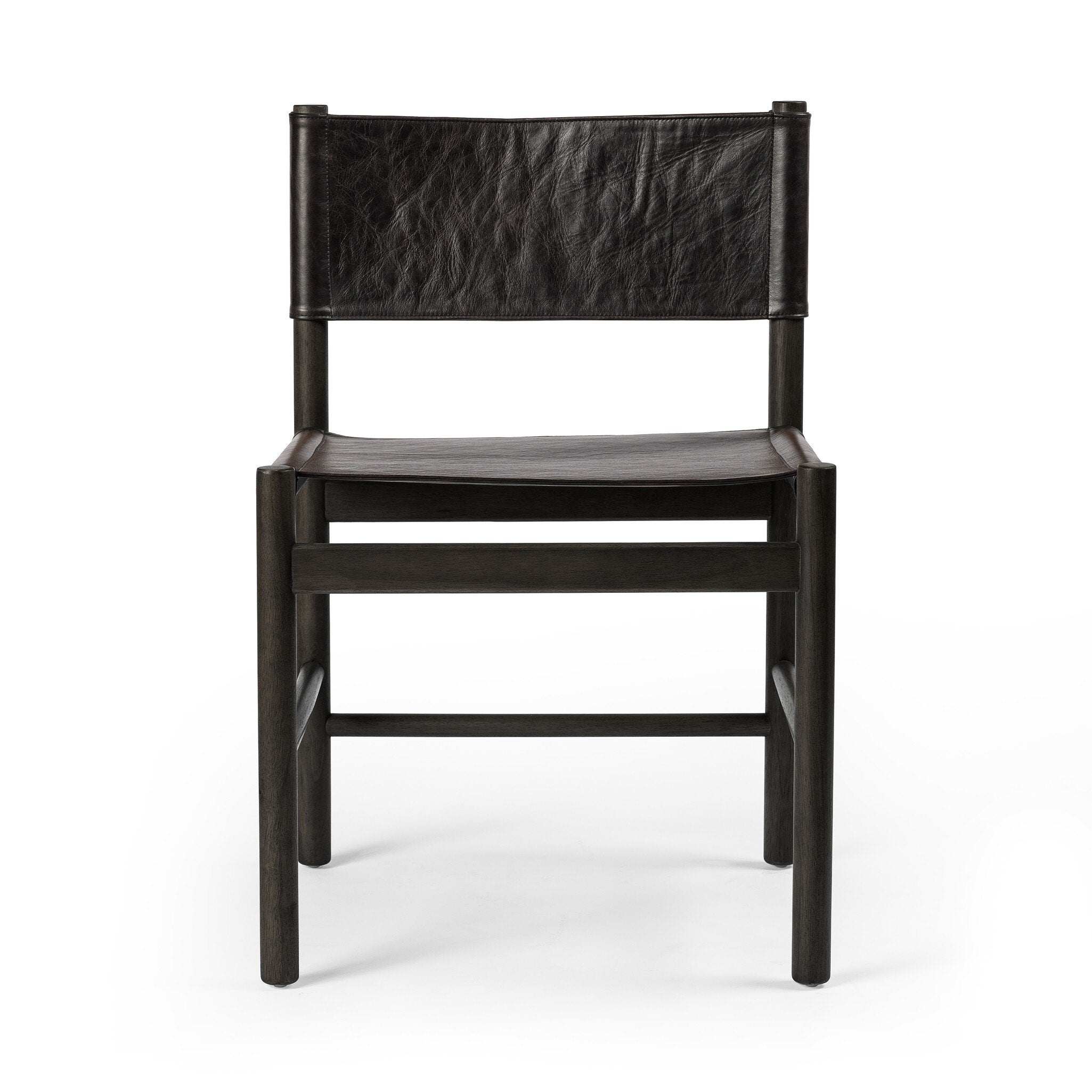 Black leather dining chair on a white background
