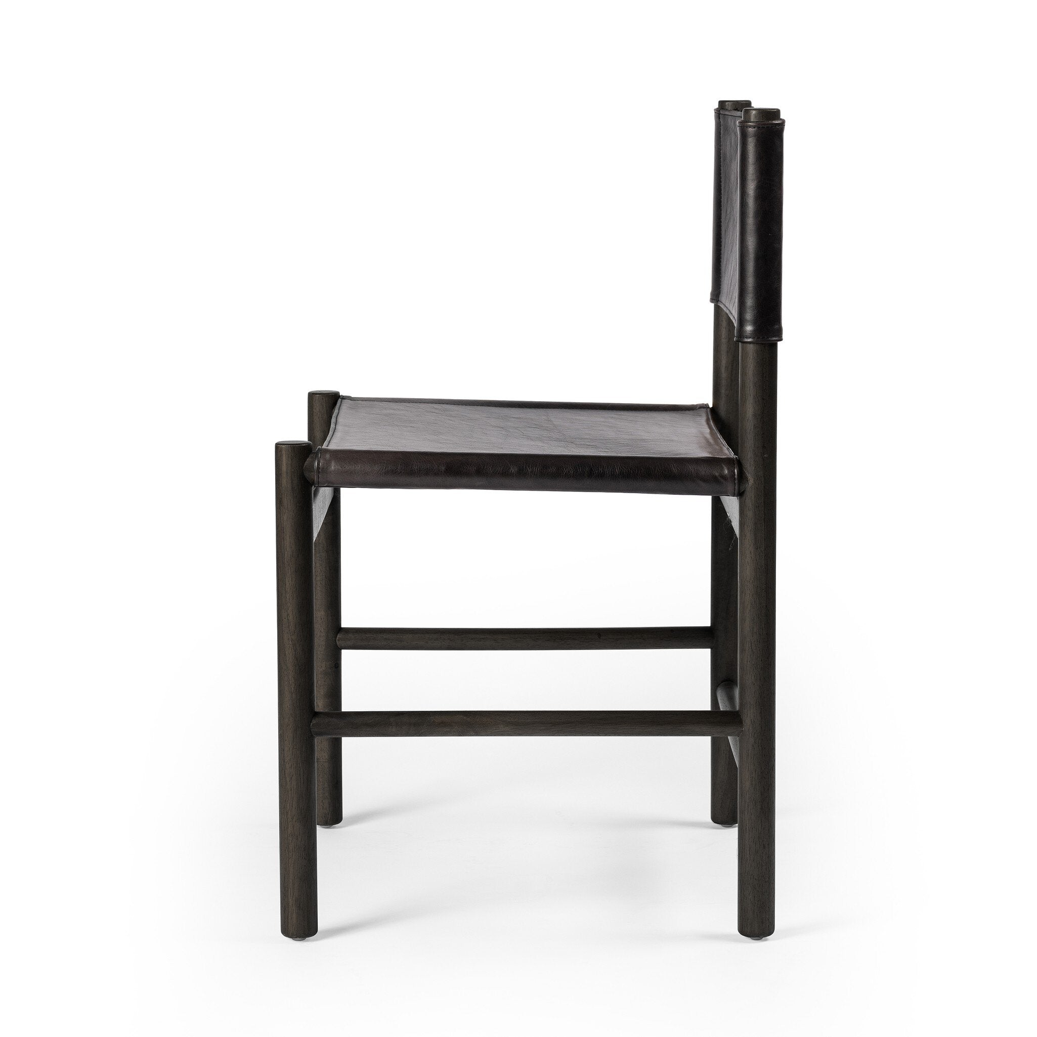 Black wooden dining chair on a white background
