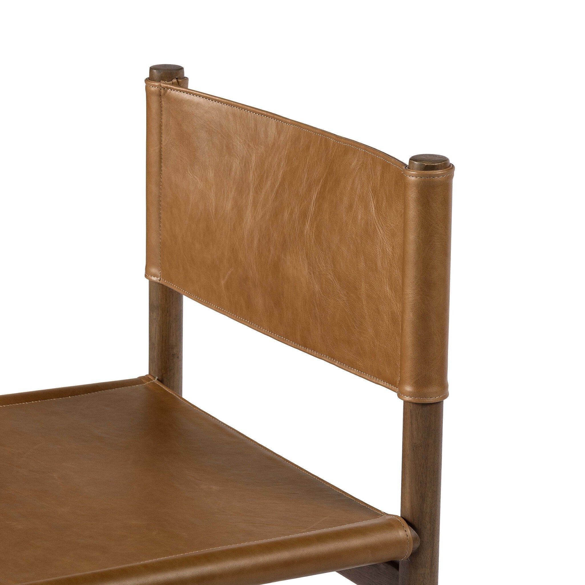 Brown leather chair with a white background