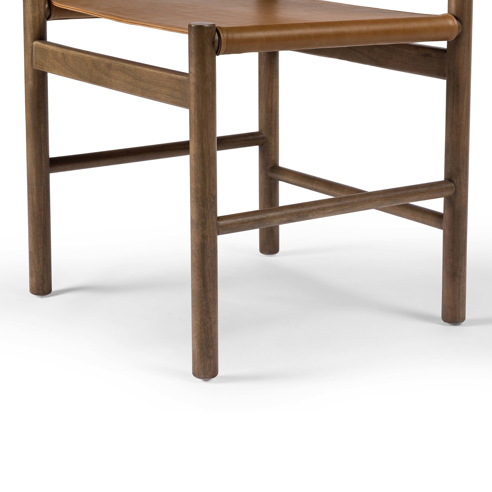 Wooden chair with a brown seat on a white background