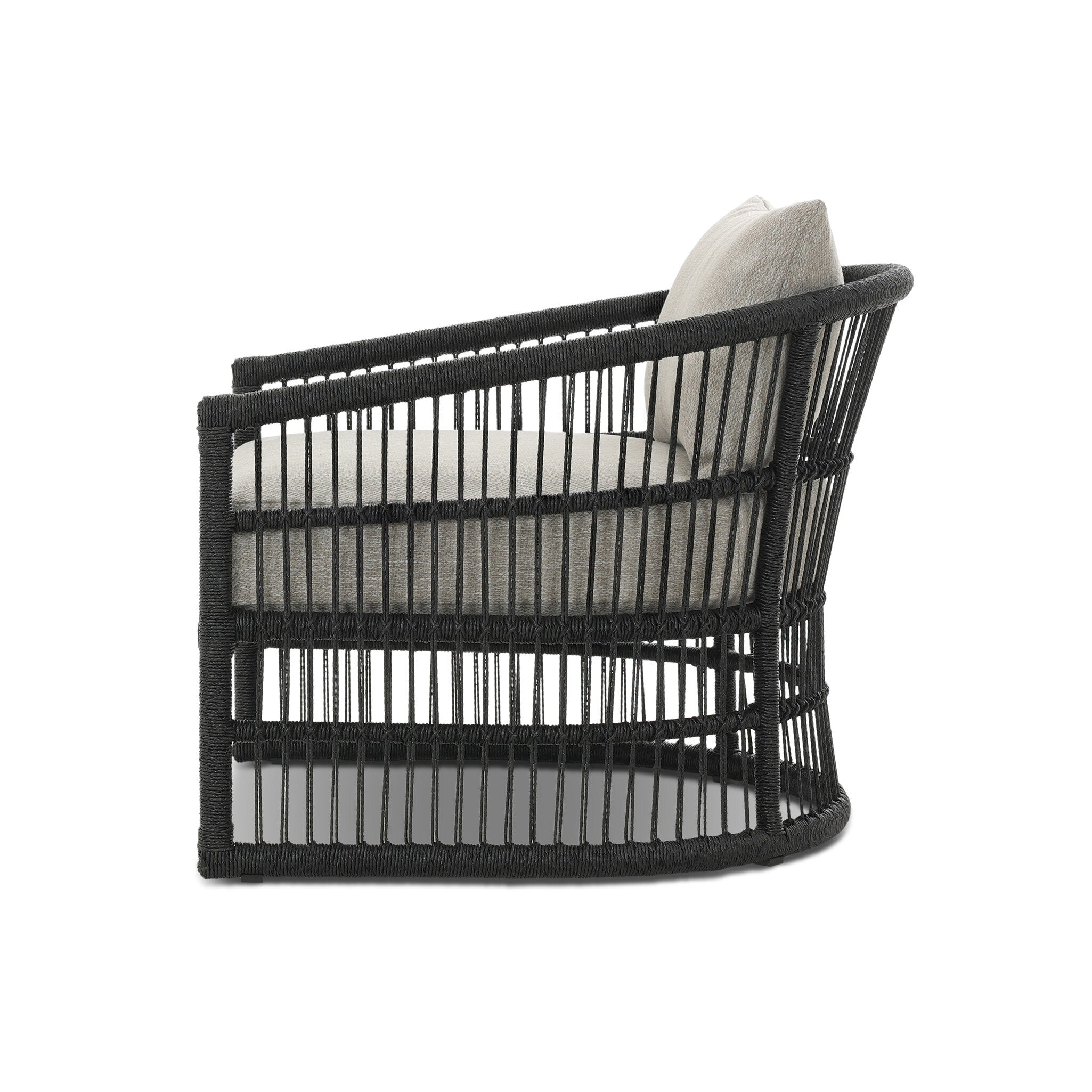 Black wicker armchair with a gray cushion on a white background