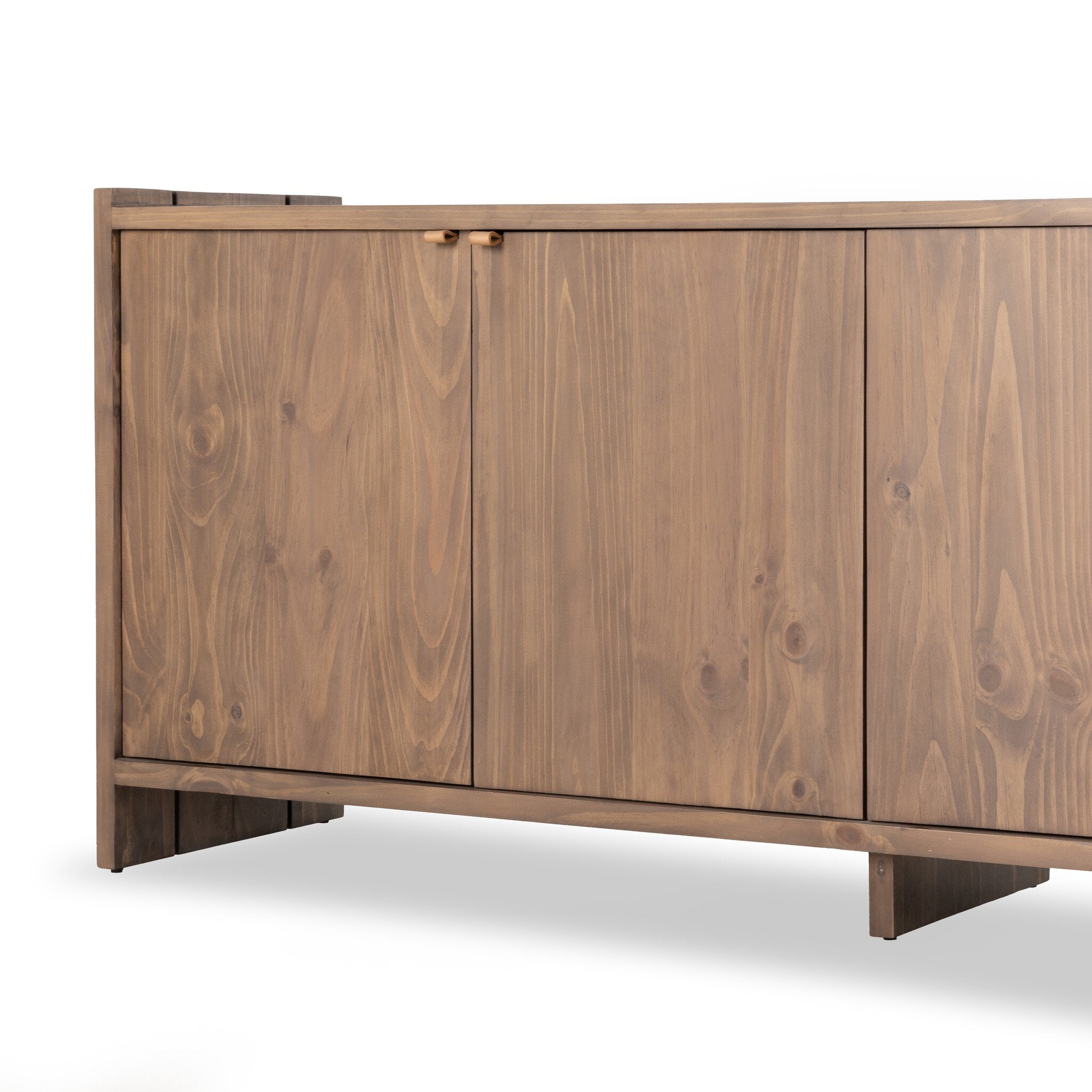 Wooden sideboard with a natural finish on a white background