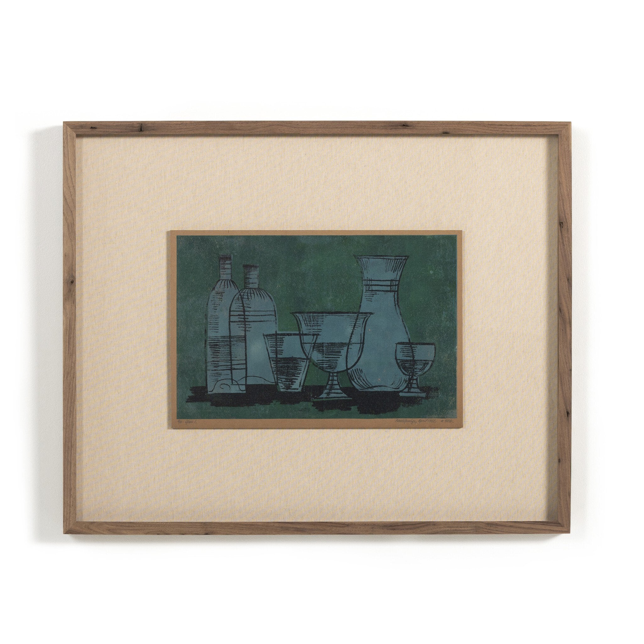 Framed artwork of bottles and glasses on a green background