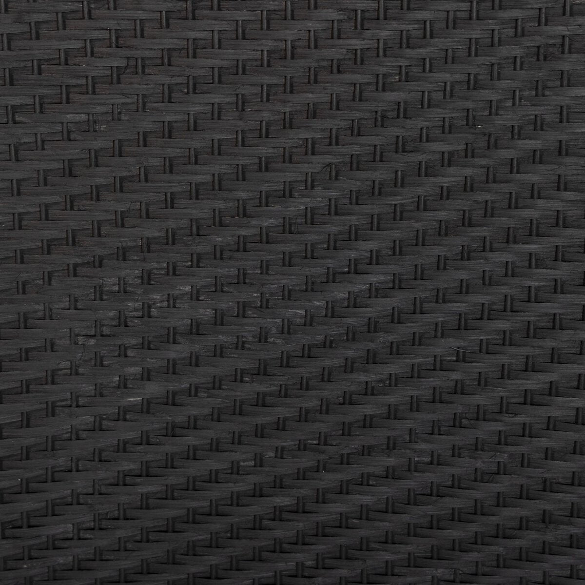 Close-up of a textured black surface with a subtle pattern