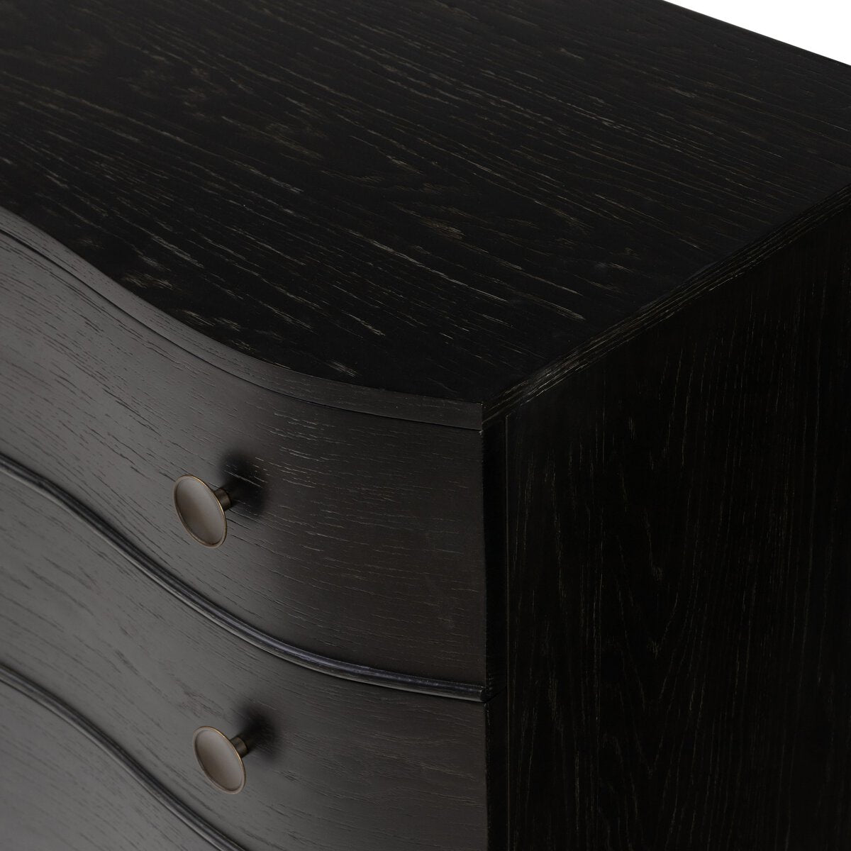 Dark wooden dresser with two drawers and white knobs on a white background