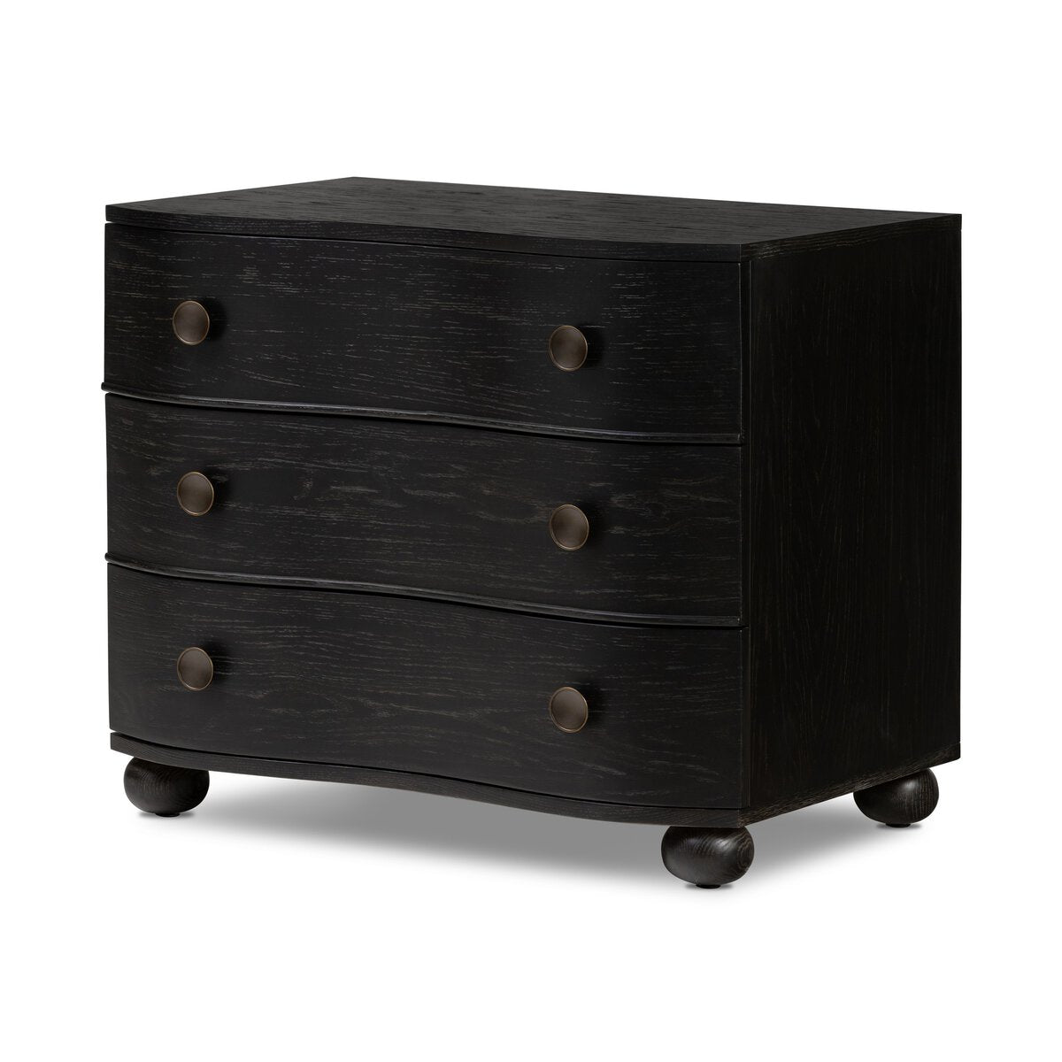 Black three-drawer dresser on a white background