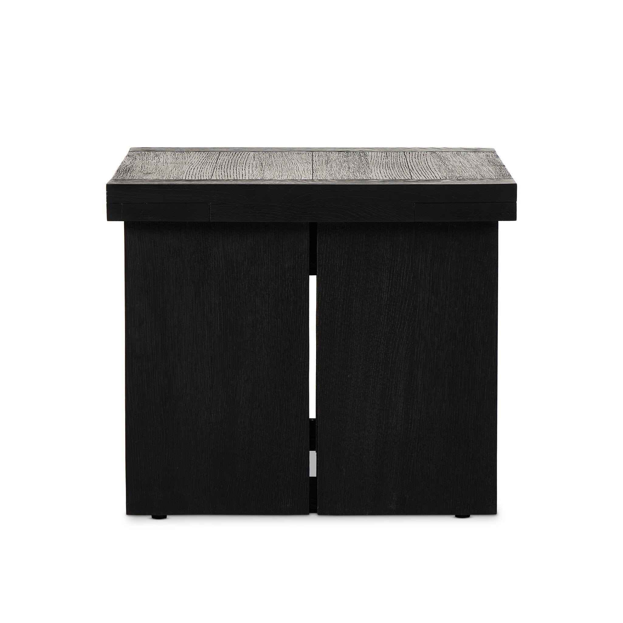 Black side table with textured top on a white background