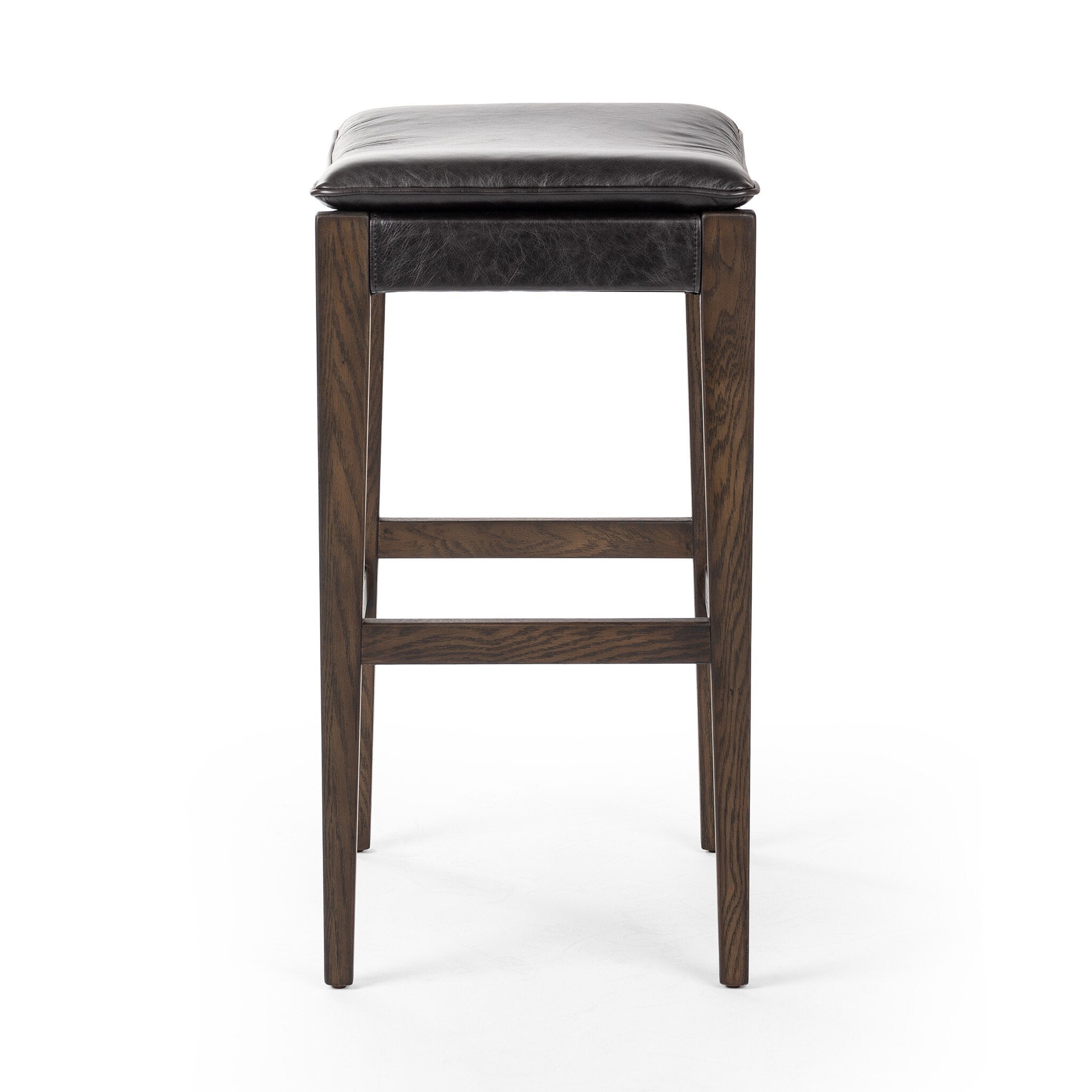 Wooden bar stool with a gray cushion on a white background