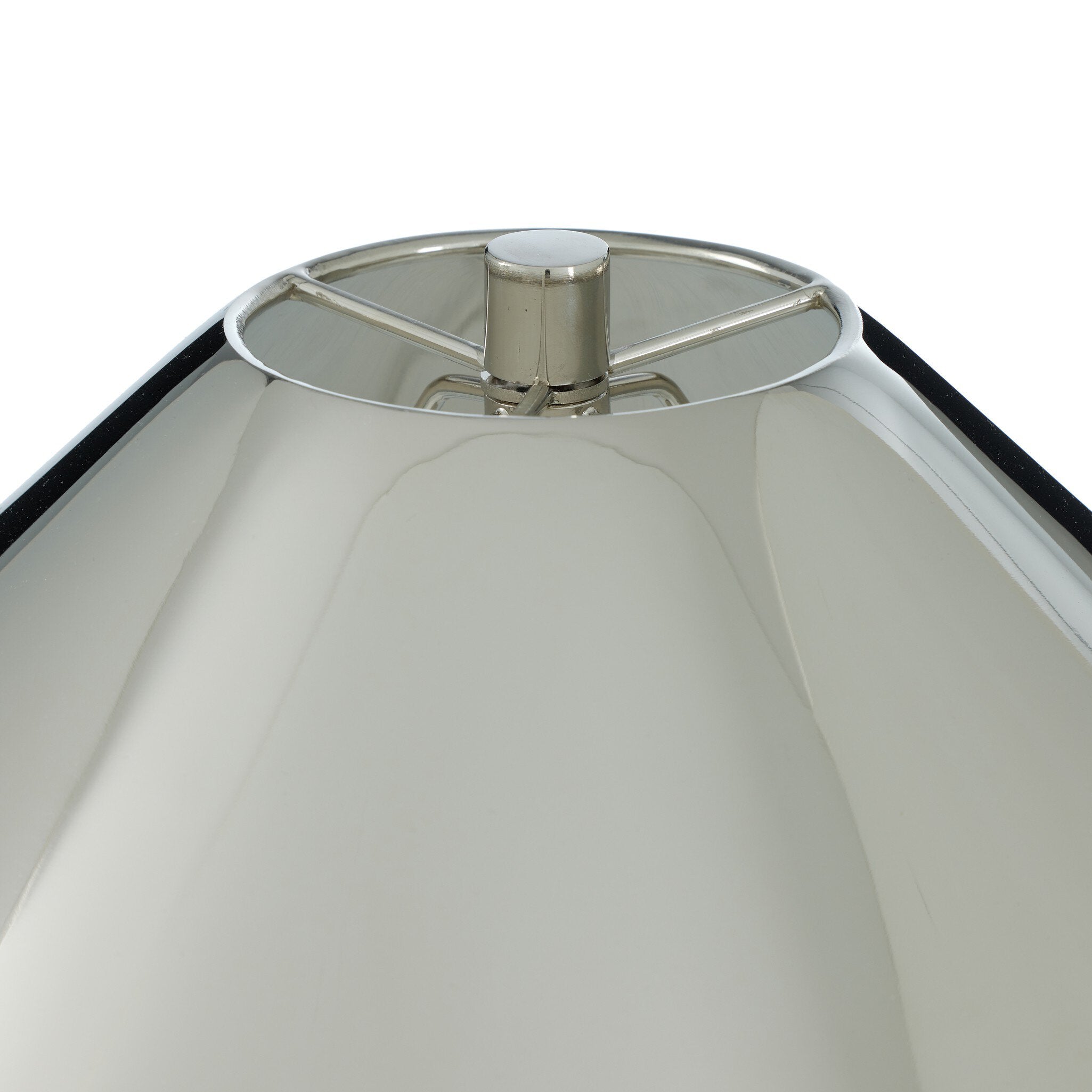 Close-up of a lampshade with a metallic fitting on a white background