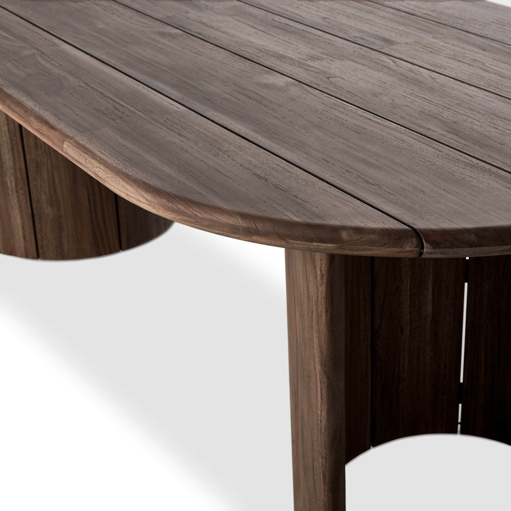 Close-up of a wooden table with a white background