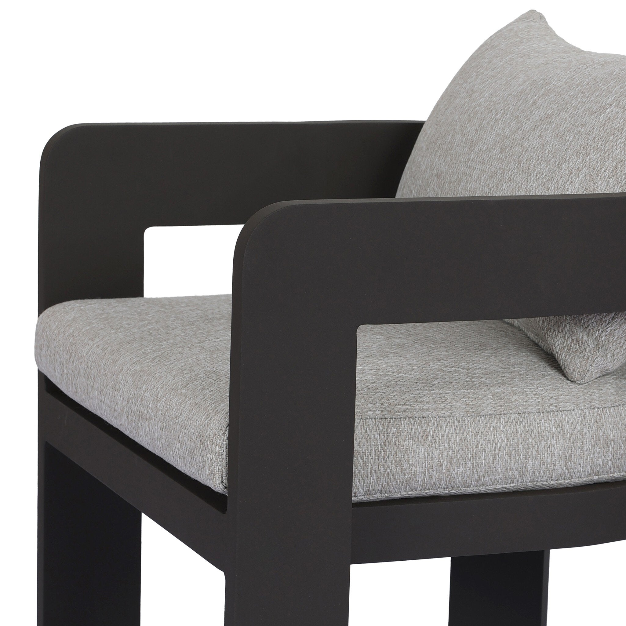 Black outdoor chair with gray cushions on a white background