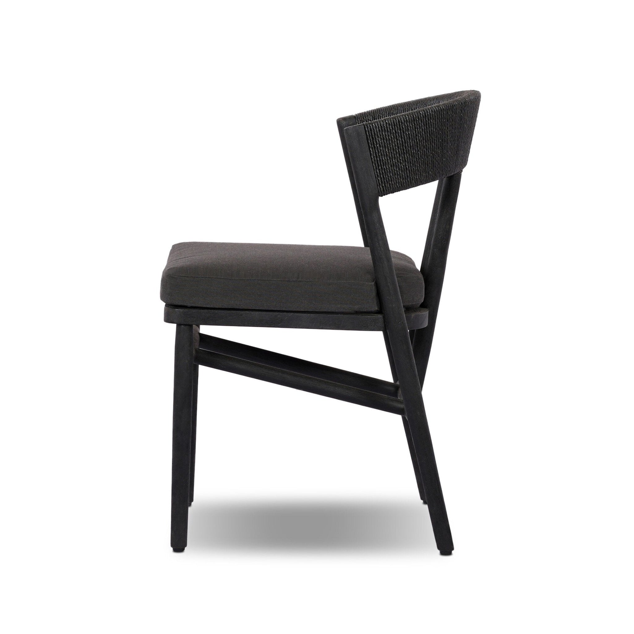 Black outdoor chair with woven backrest on a white background