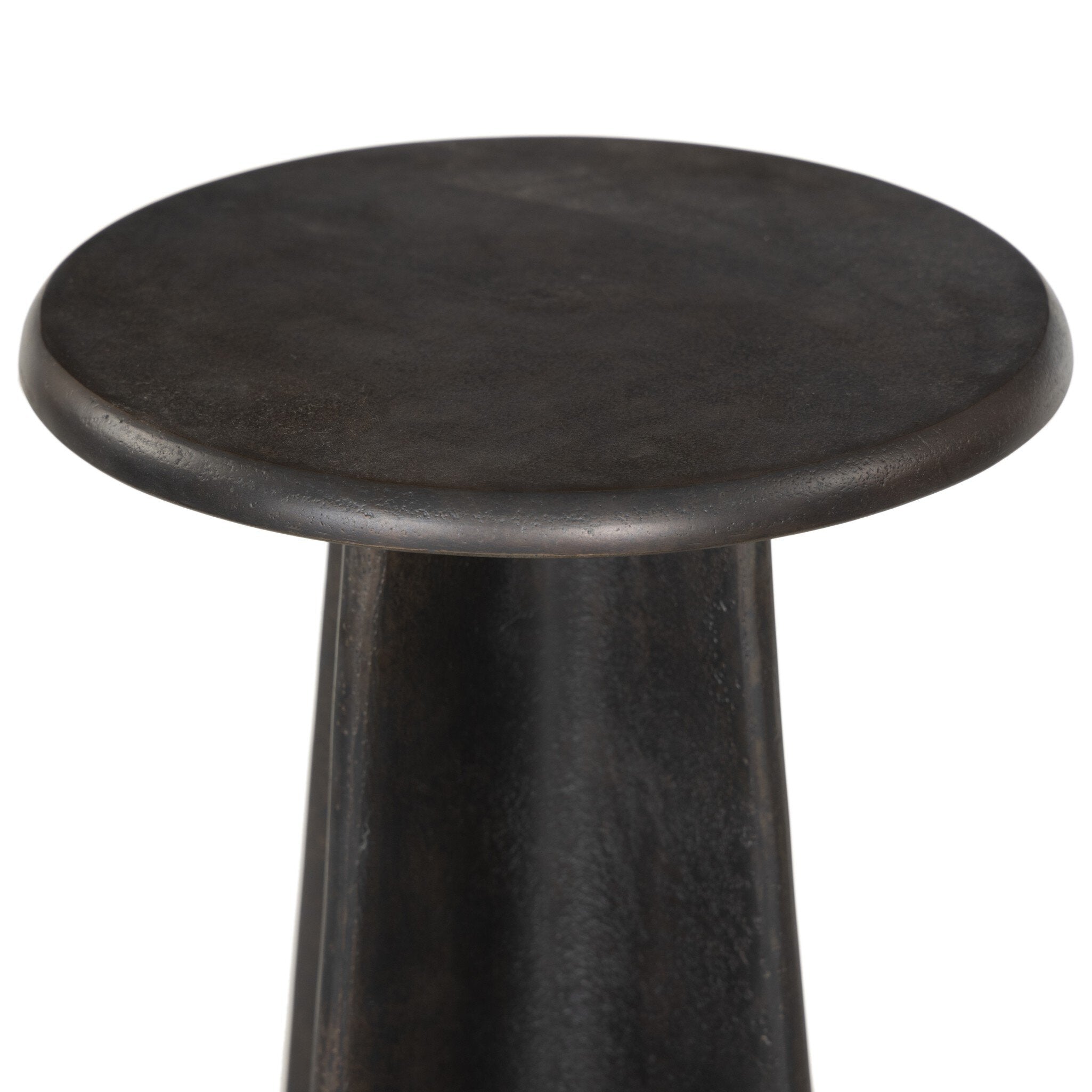 Black round end table on a white background