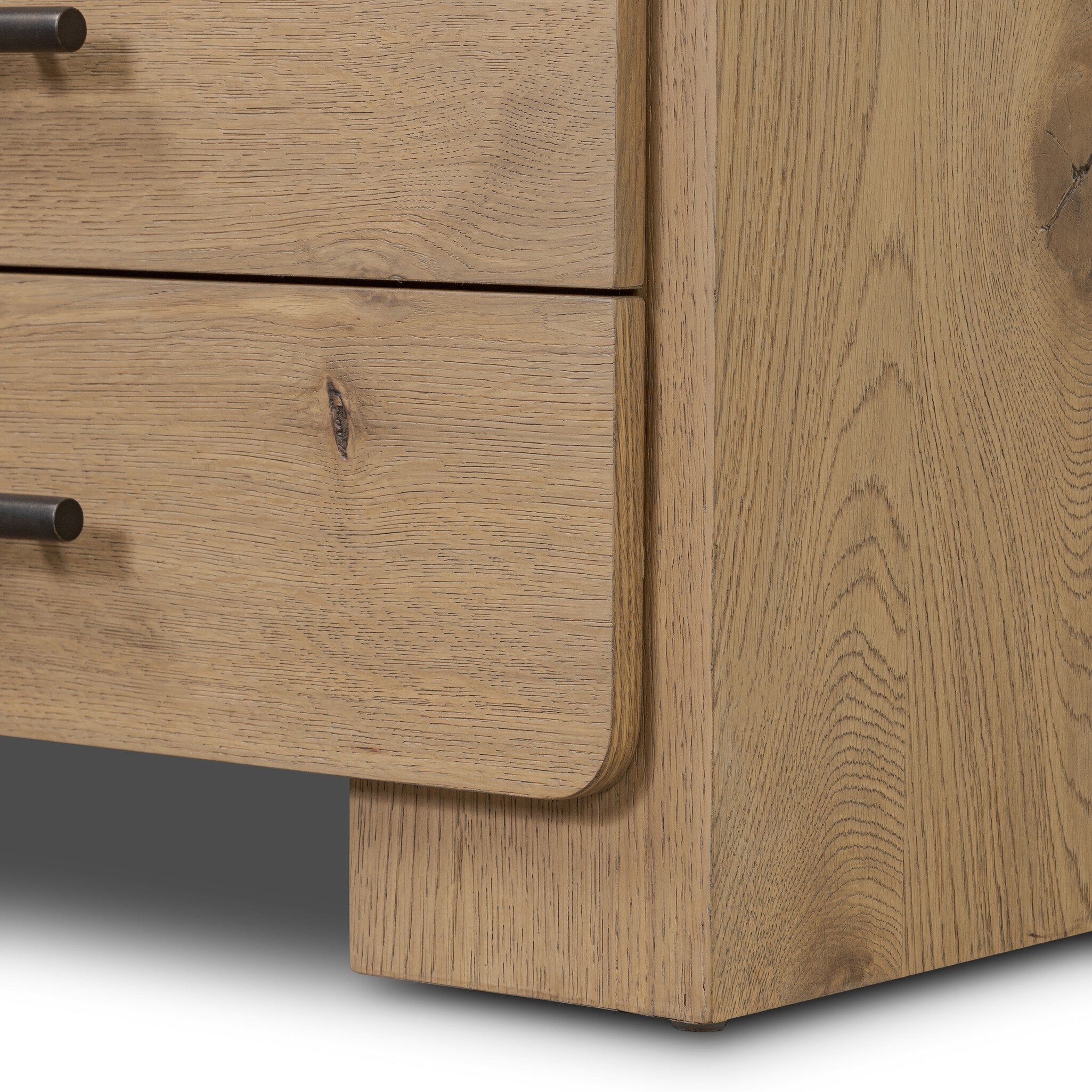 Close-up of a wooden dresser with two drawers.
