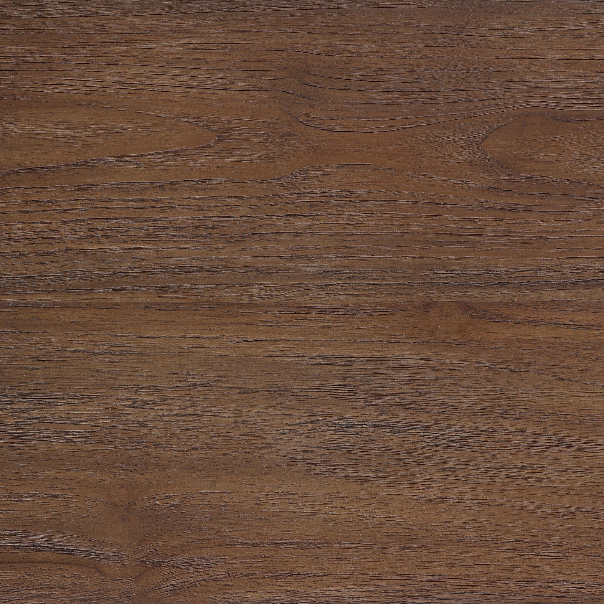 Close-up of a wooden surface with a brown finish
