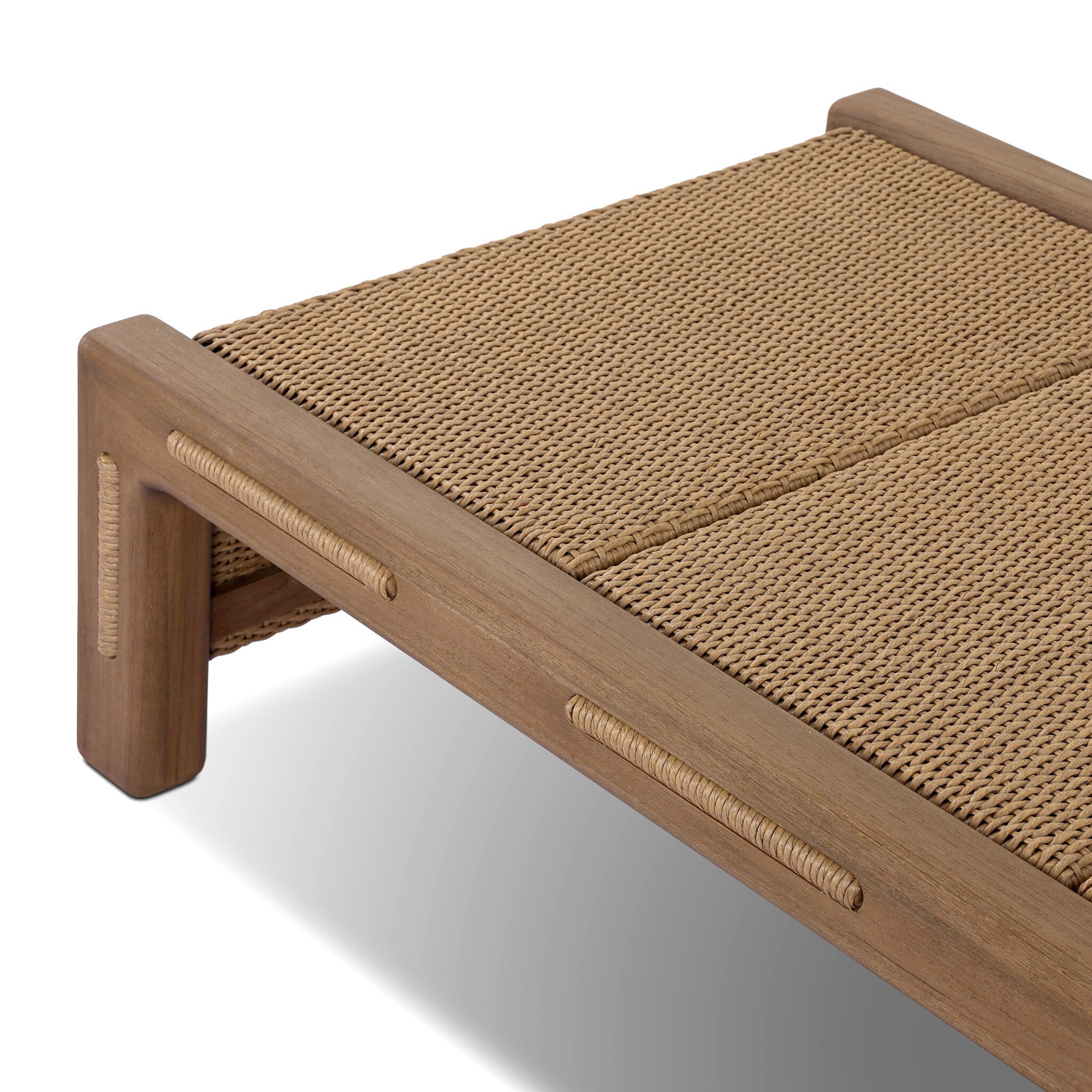 Wooden bench with woven seat on a white background