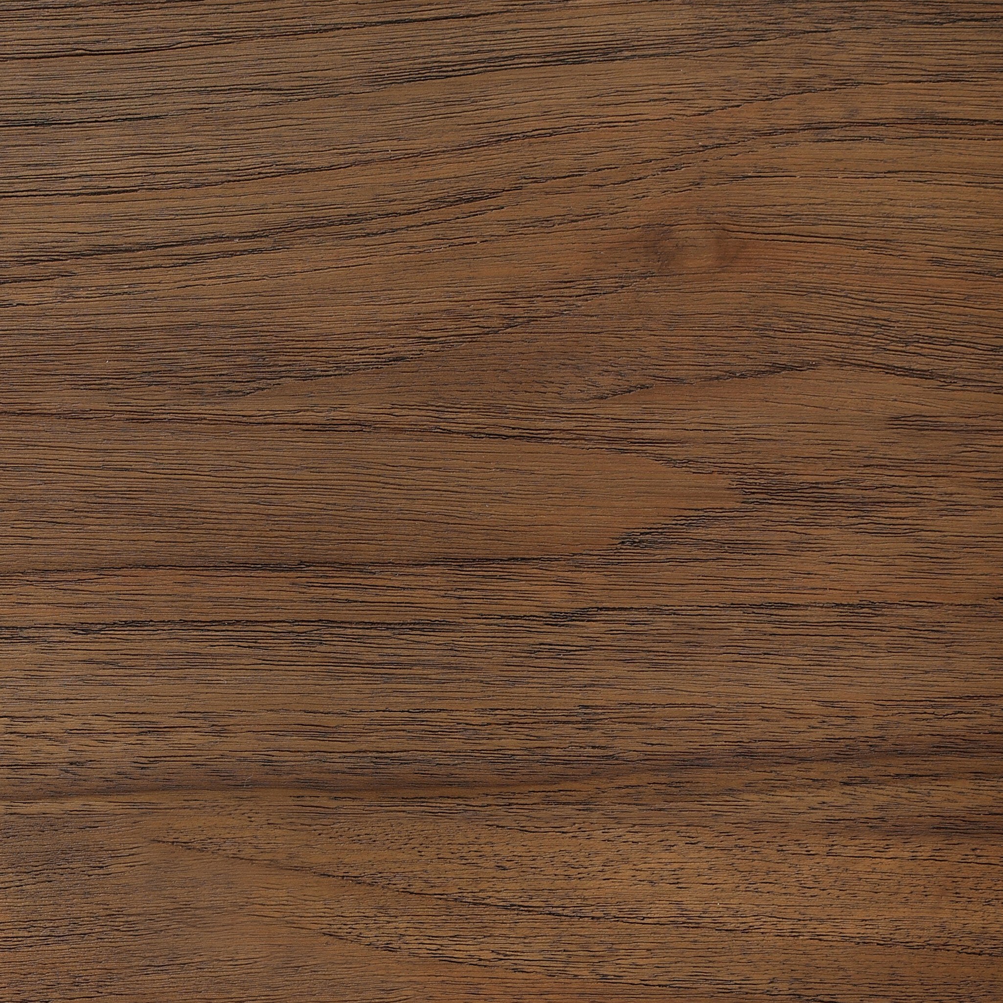 Close-up of a wooden surface with a rich brown color and visible grain.