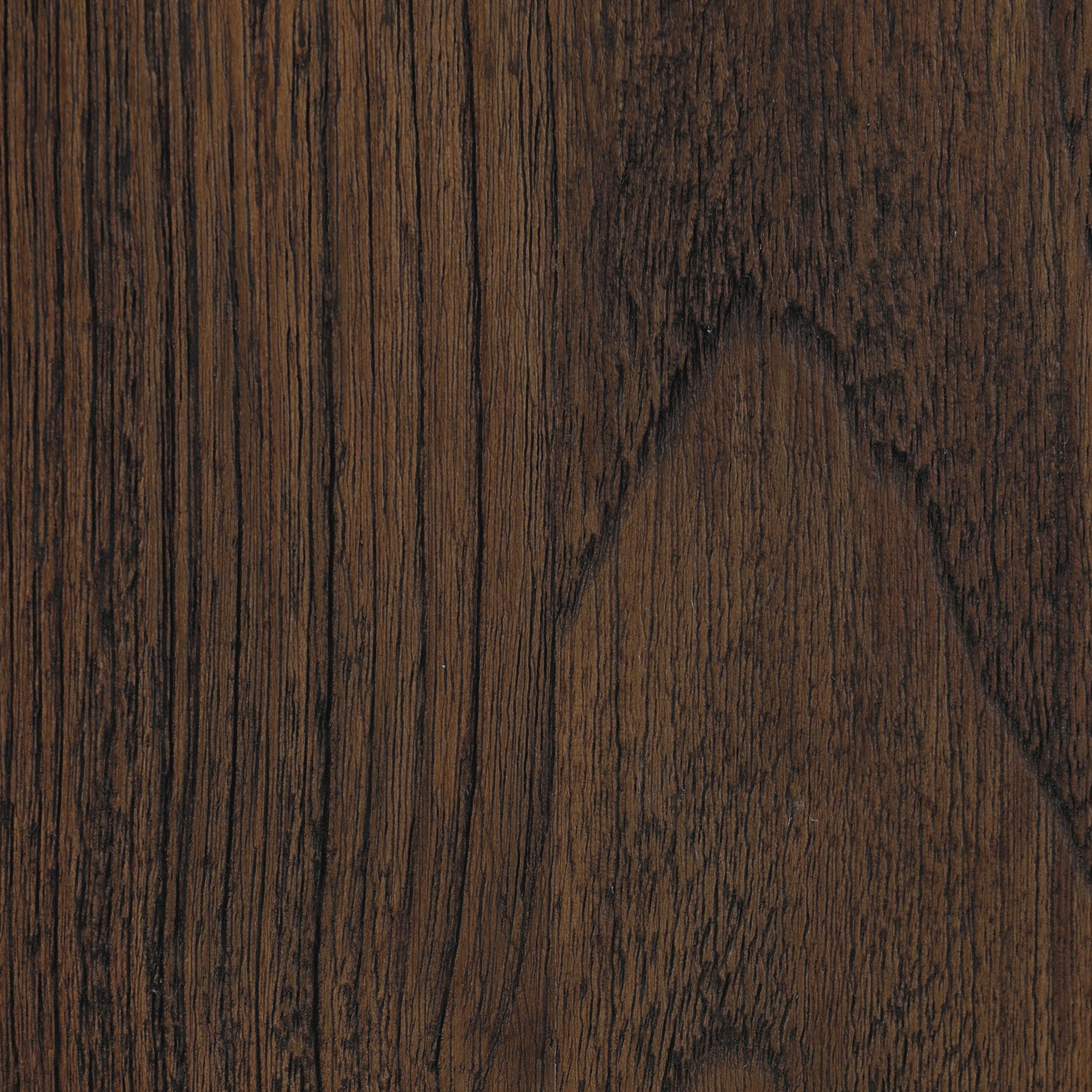 Close-up of dark brown wood texture